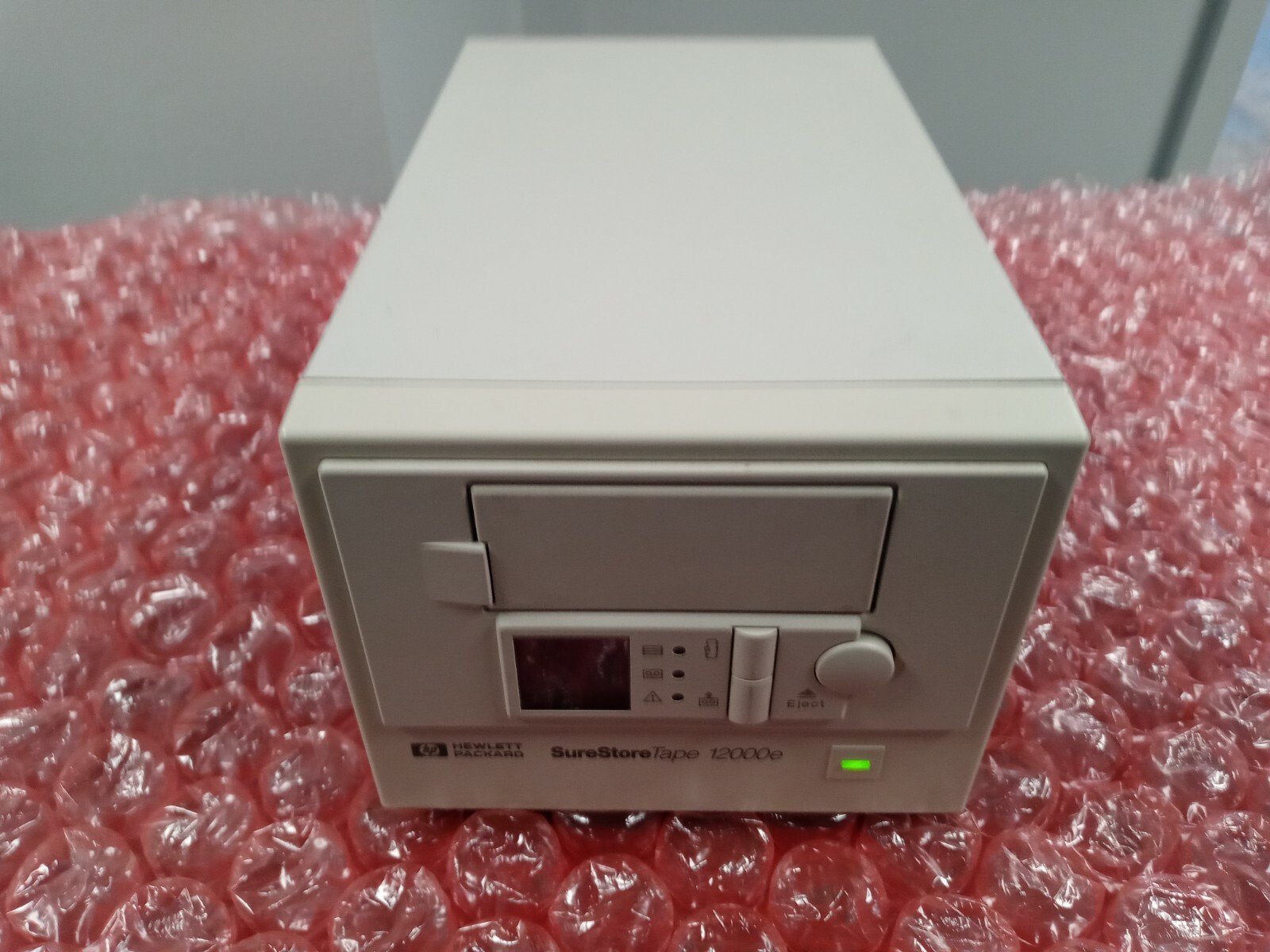 HP SureStore 12000e  model C1561-69301 with 30 day warranty