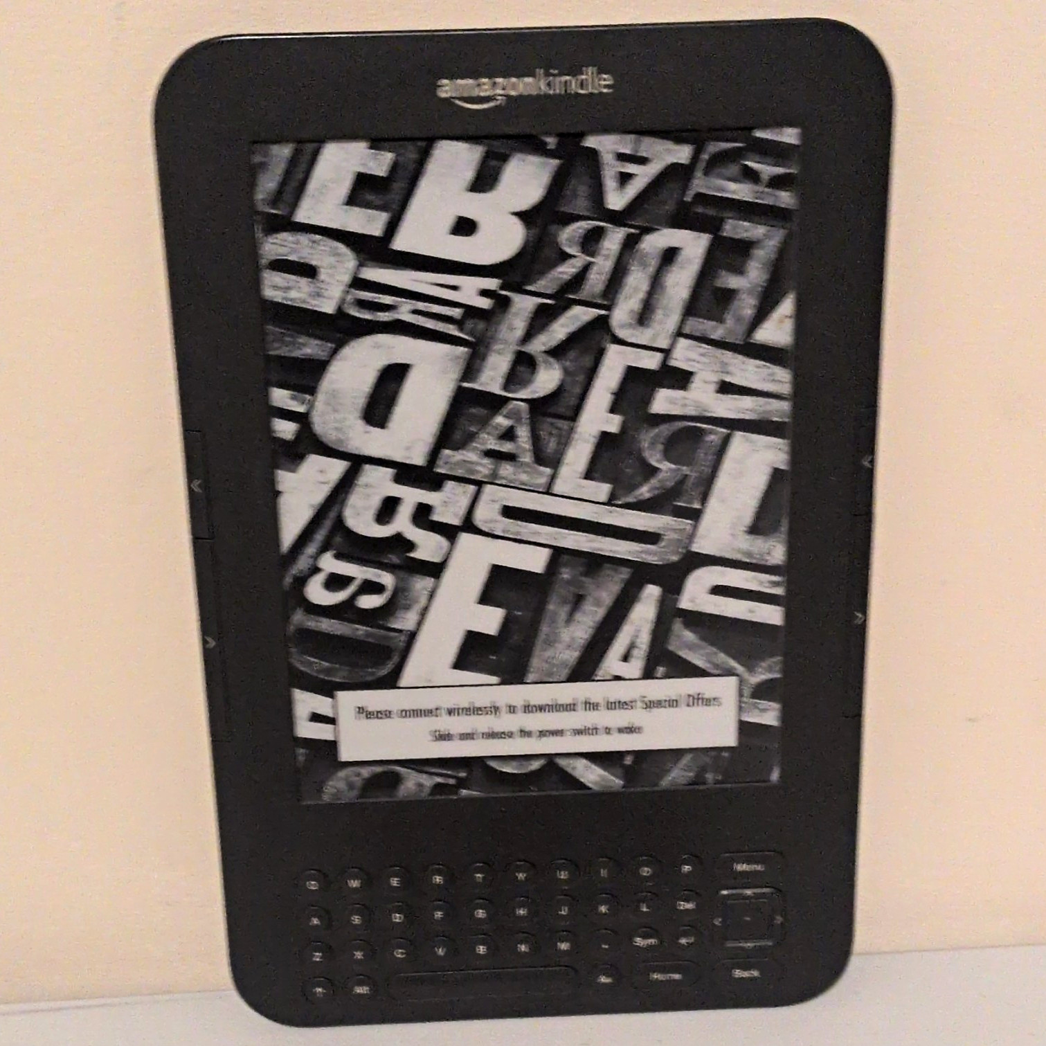 Amazon Kindle  3rd Gen 6in Wi‑Fi eBook Reader .  good condition .  no cord