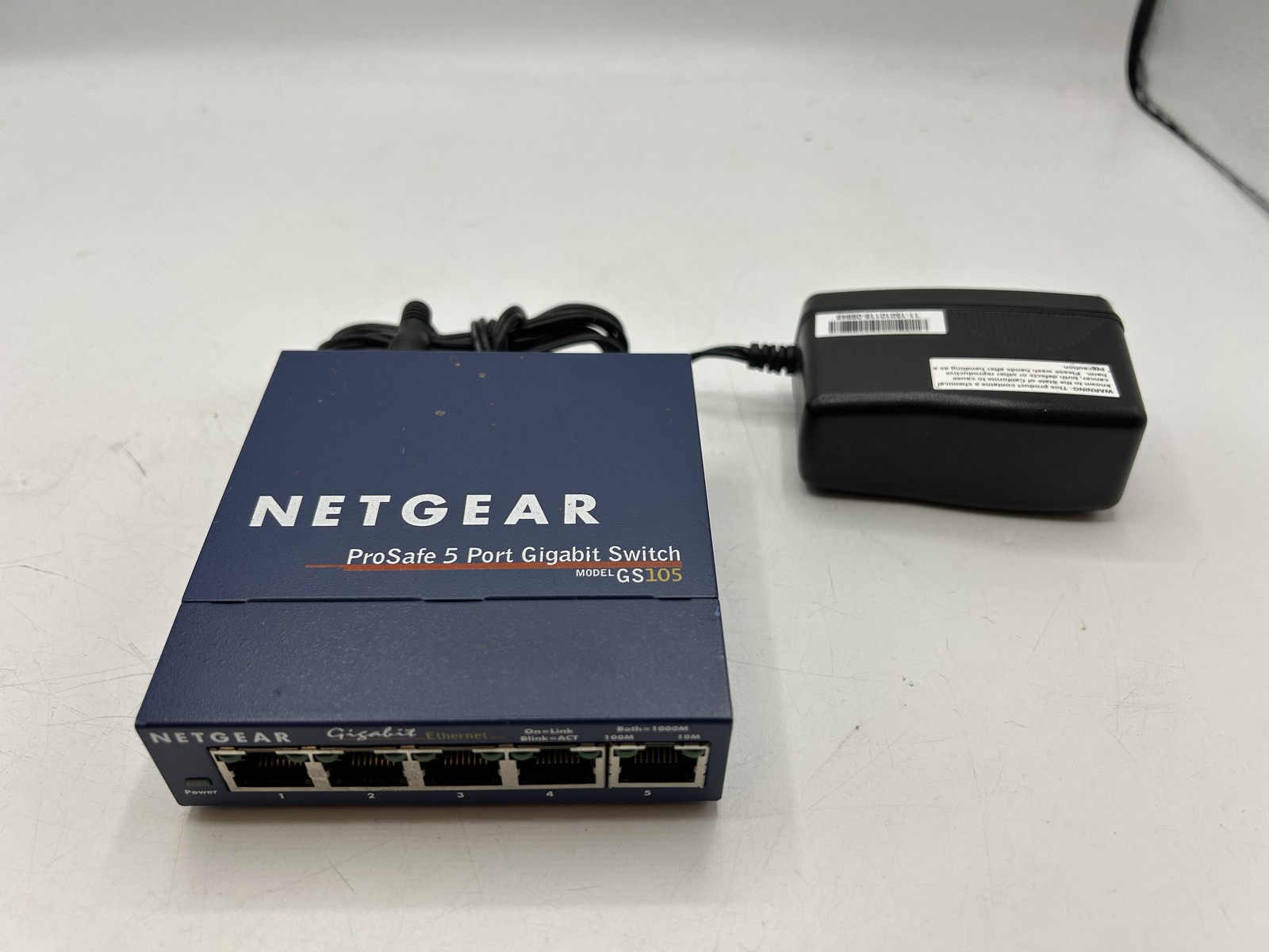 NETGEAR ProSafe FS105 v2 5-Port 10/100 Ethernet Switch w/ Power Adapter