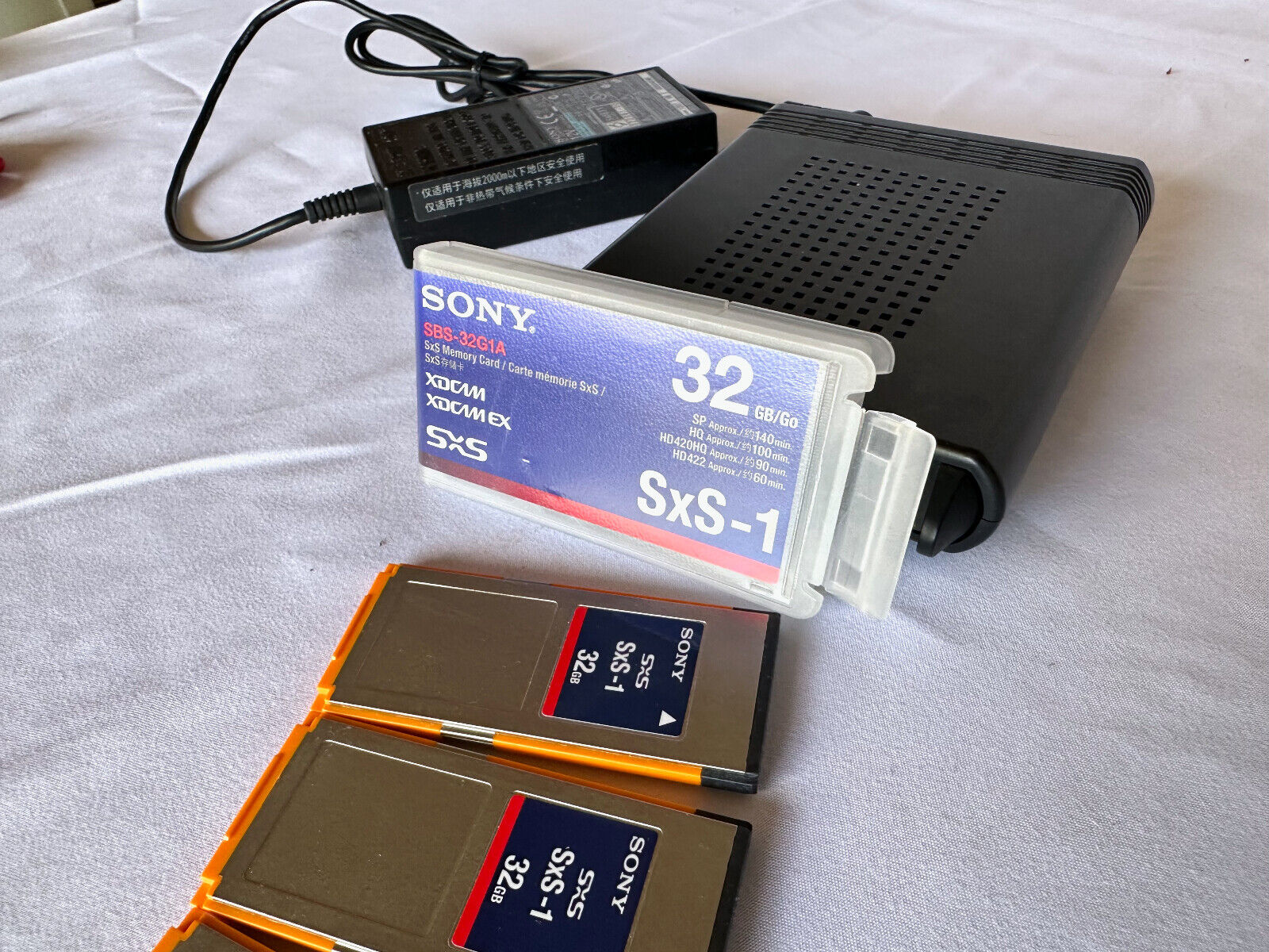 Sony SBAC-US10 SxS Memory Card USB Reader Writer with THREE 32 GB SXS cards