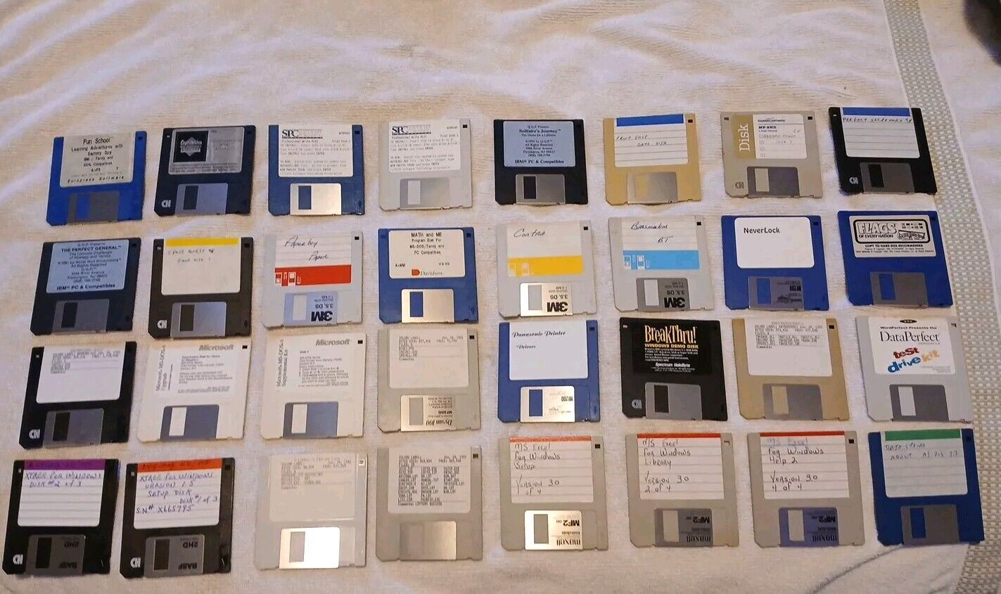 3.5 floppy disk Lot Of 32 Random Software Games Ect Sold As Shown 