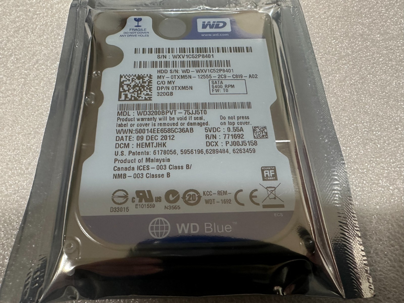 Dell 0TXM5N WESTERN DIGITAL WD3200BPVT 320 GB SATA  Laptop Hard Drive