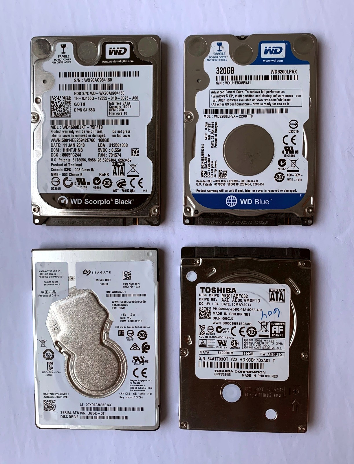 Lot of four (4) 2.5" (laptop) internal SATA drives - 500GB, 320GB, 320GB, 160GB