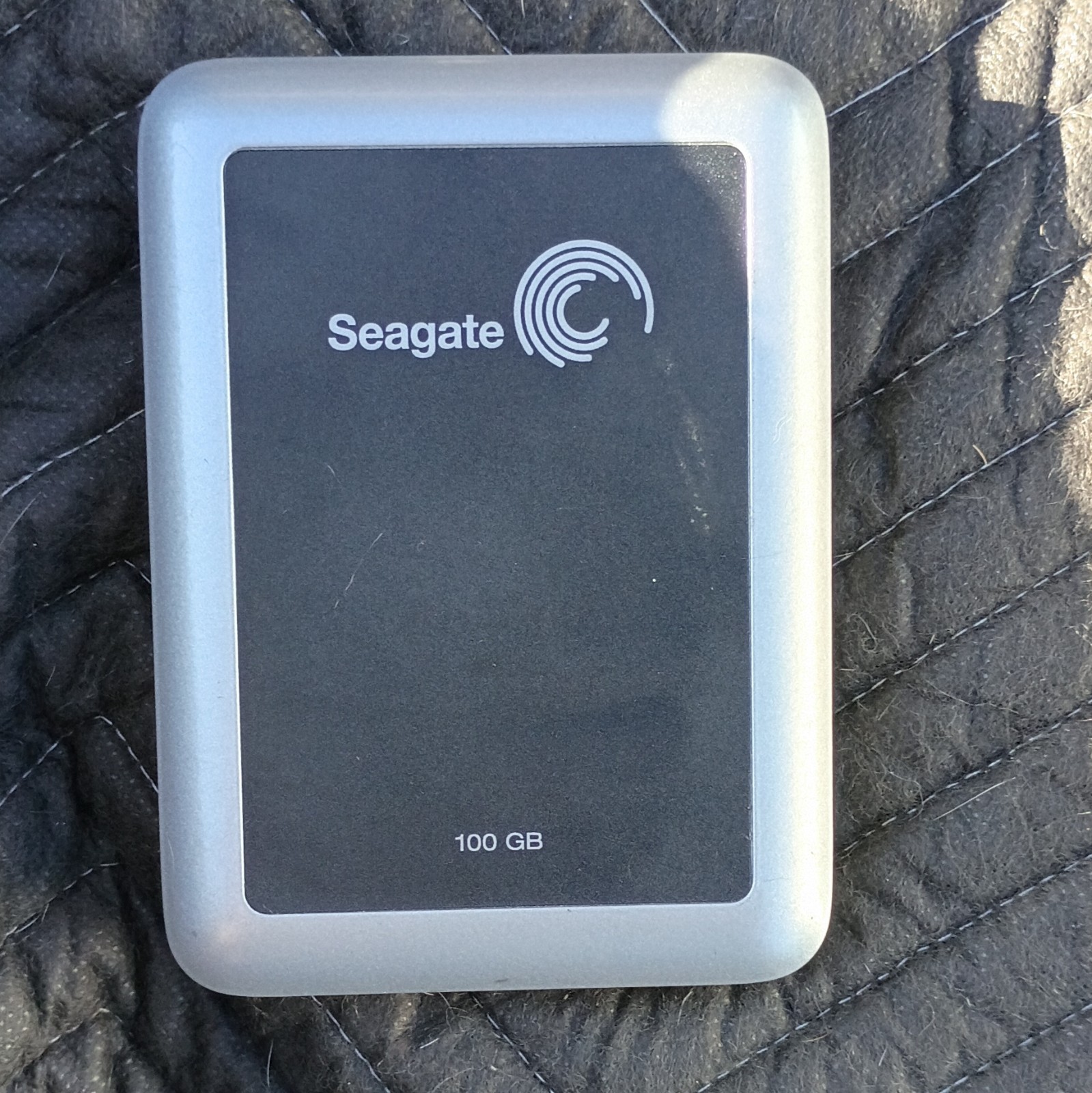 “Vintage Seagate 100GB External Hard Drive ST9100801U2RK - Untested / As-Is”.