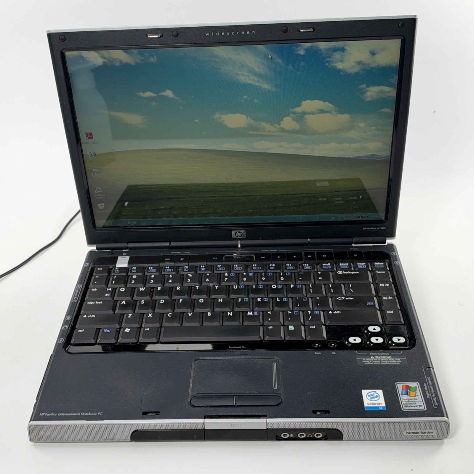 HP Pavilion dv1000 14” 1.3 GHz Celeron M 480 MB Ram. 80 GB HD Windows XP