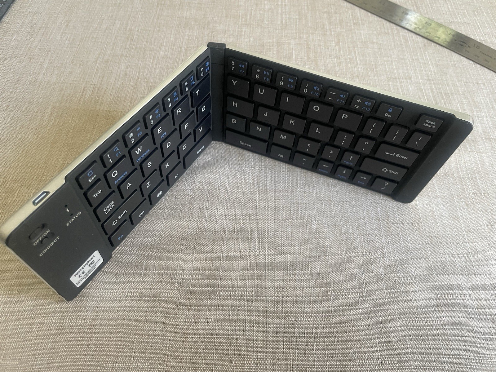 Foldable Bluetooth Keyboard w/ Phone Stand & Charging USB Wire. QWERTY English
