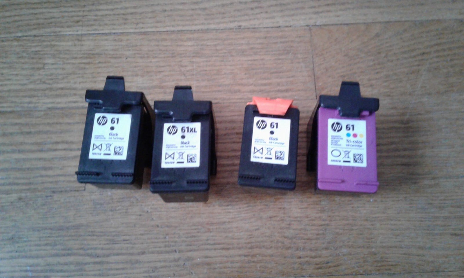 Four (4) HP ink cartridges Hp61 empty used