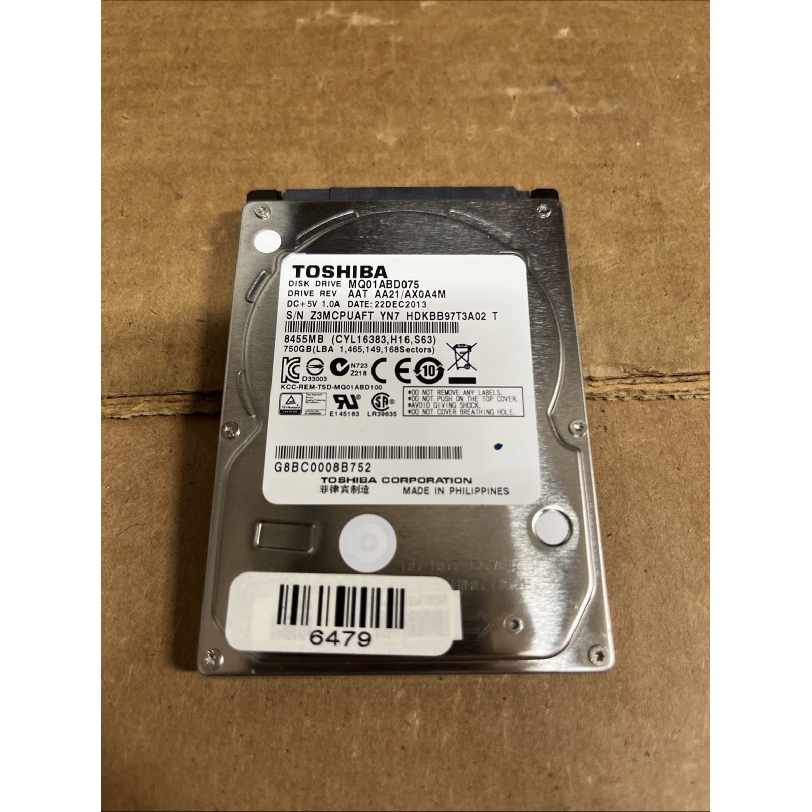 Toshiba MQ01ABD075 750GB 2.5" SATA III HDD AAT AA21/AX0A4M 22DEC2013