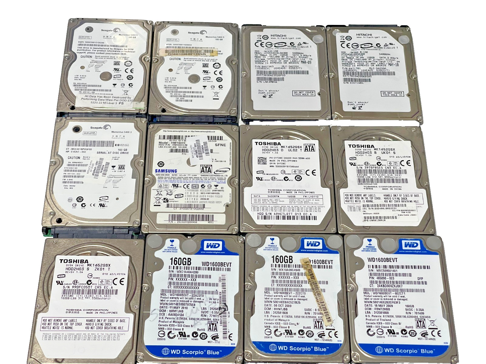 Lot of 12 Mixed 160GB SATA 2.5" Hard Drives - HGST,WD, Toshiba 7 More.
