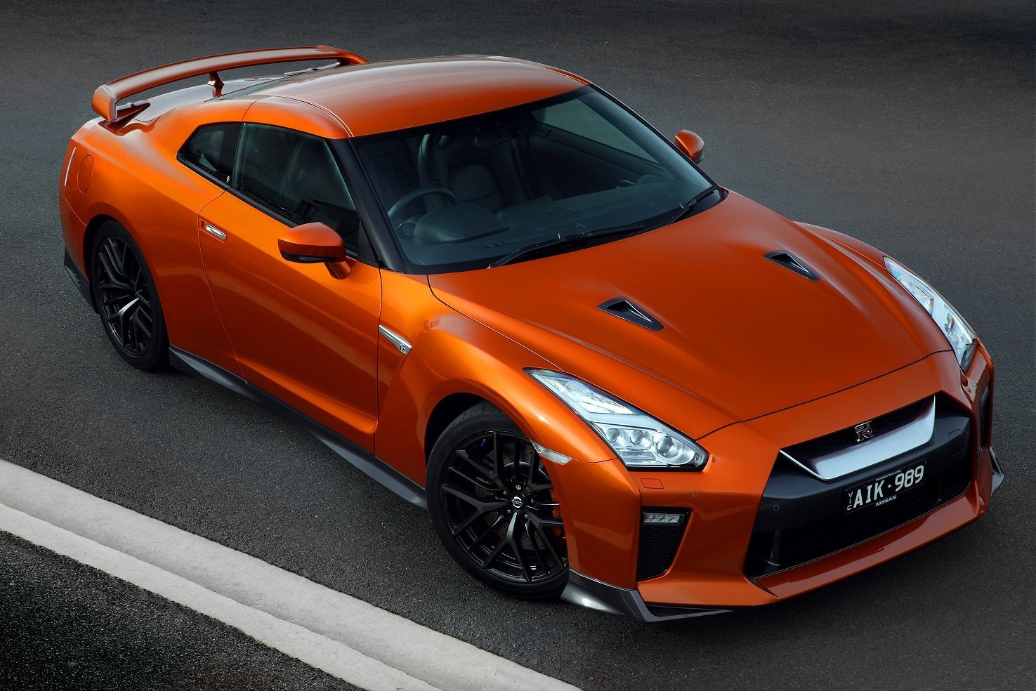 Cars nissan gt r godzilla au spec r35 orange Desk Mat Stitched
