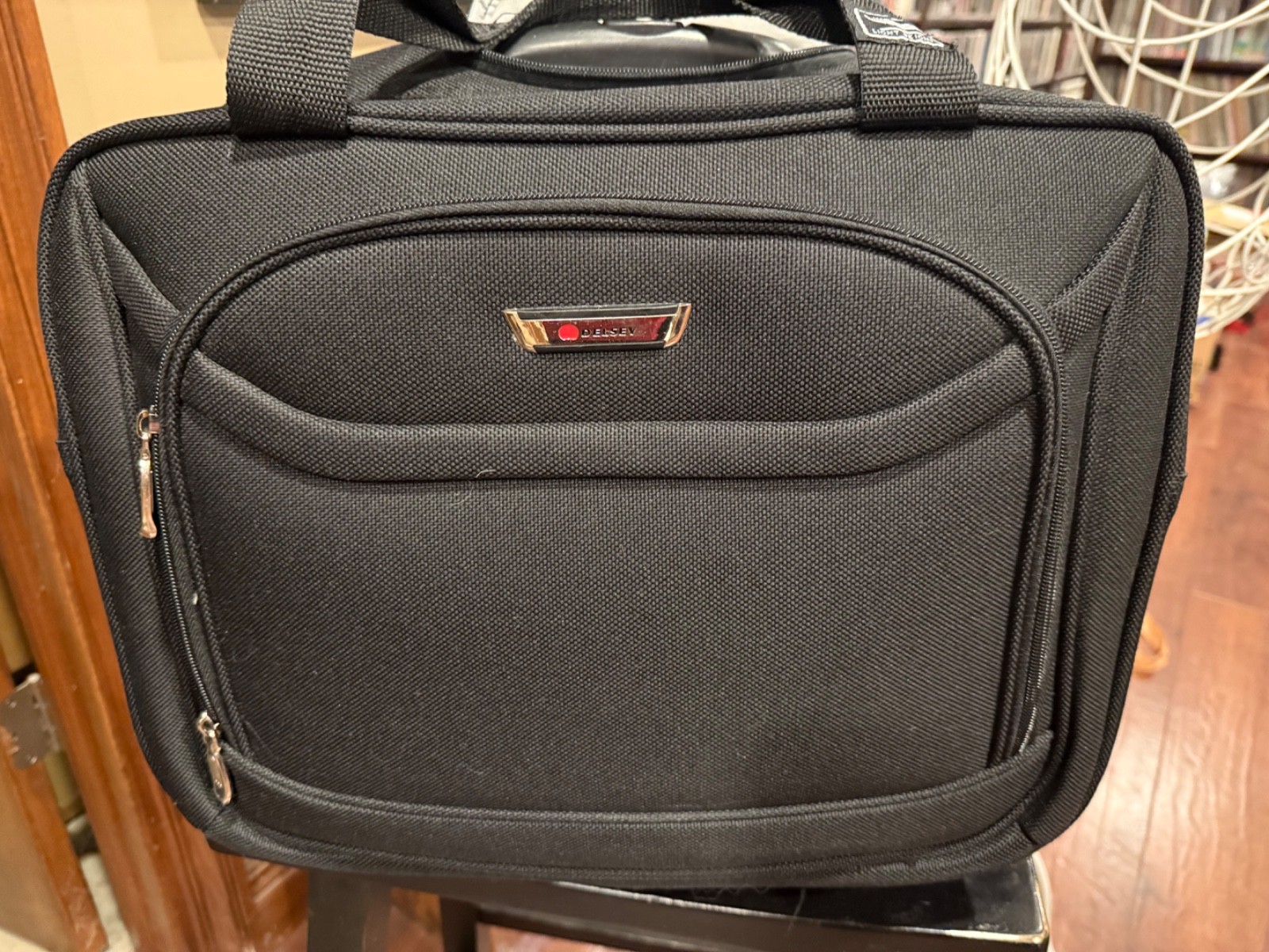 Delsey Black Rolling computer  Bag Carry On