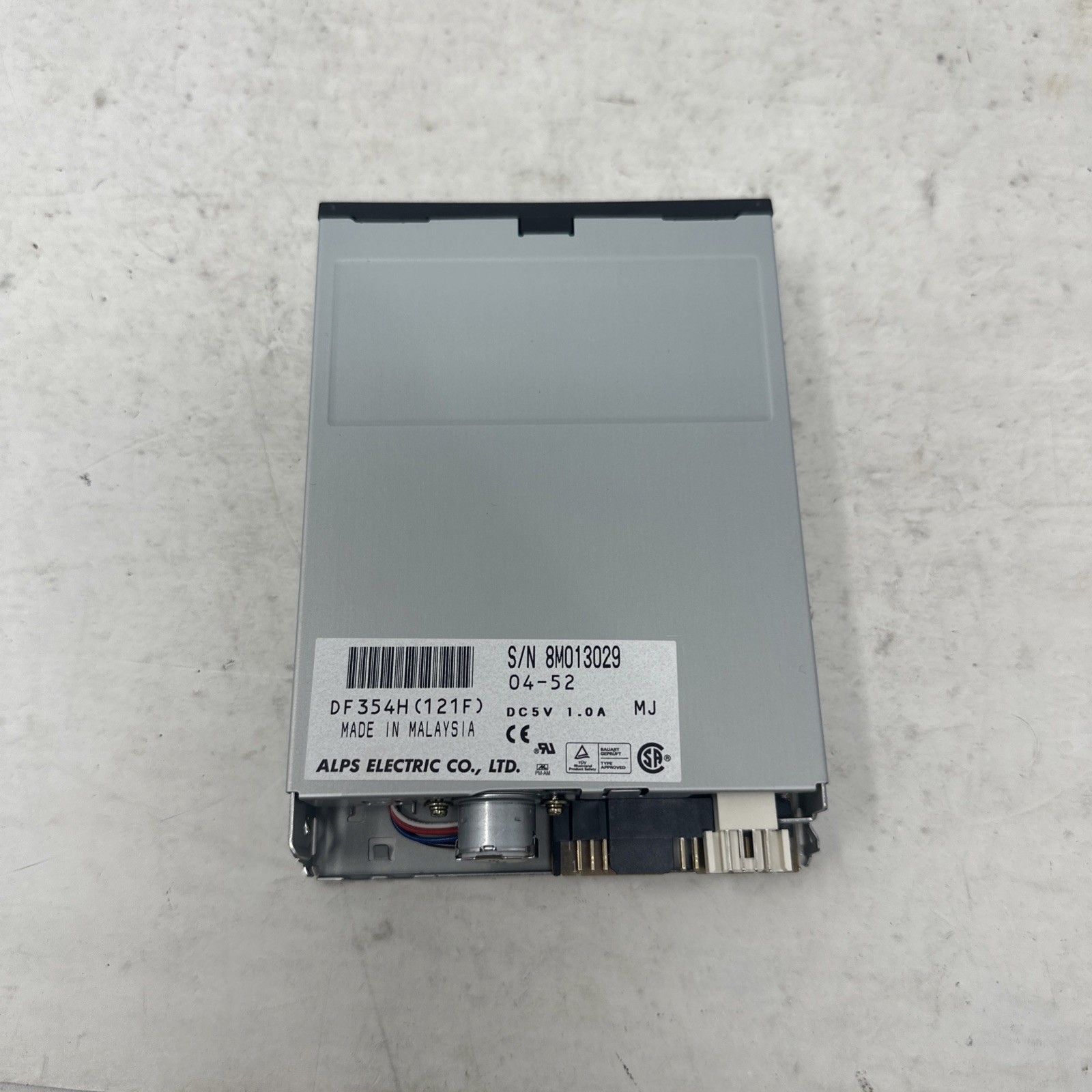 Alps Electric Co  DF354H(121F)  Black Front -  Floppy Disk Drive-301