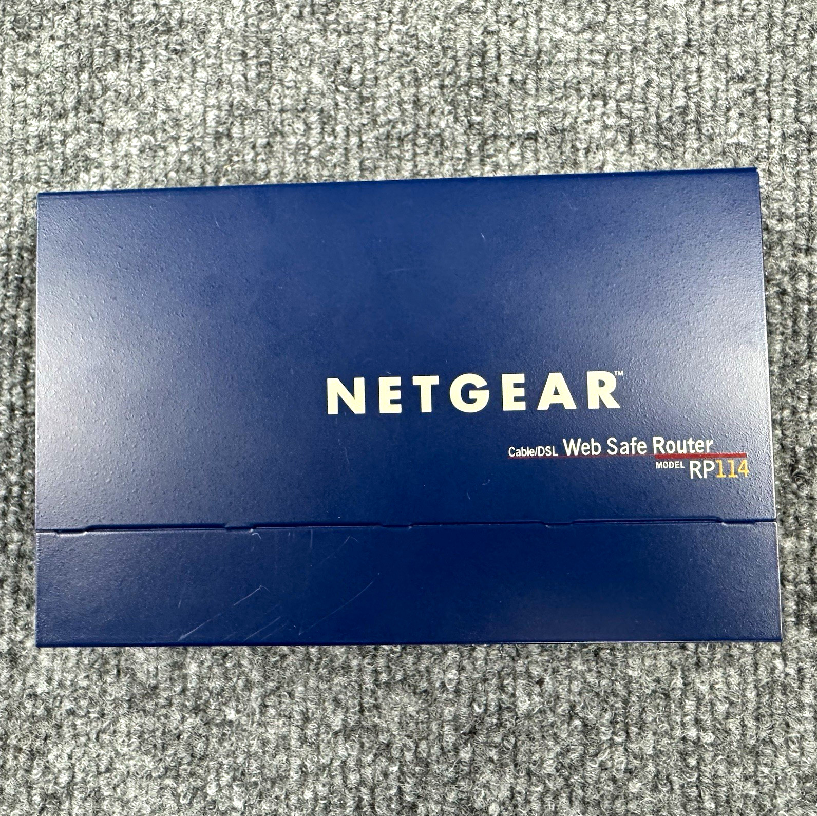 NETGEAR RP114 Wired Router, 4-Port 100 Mbps Ethernet (RJ-45), Blue