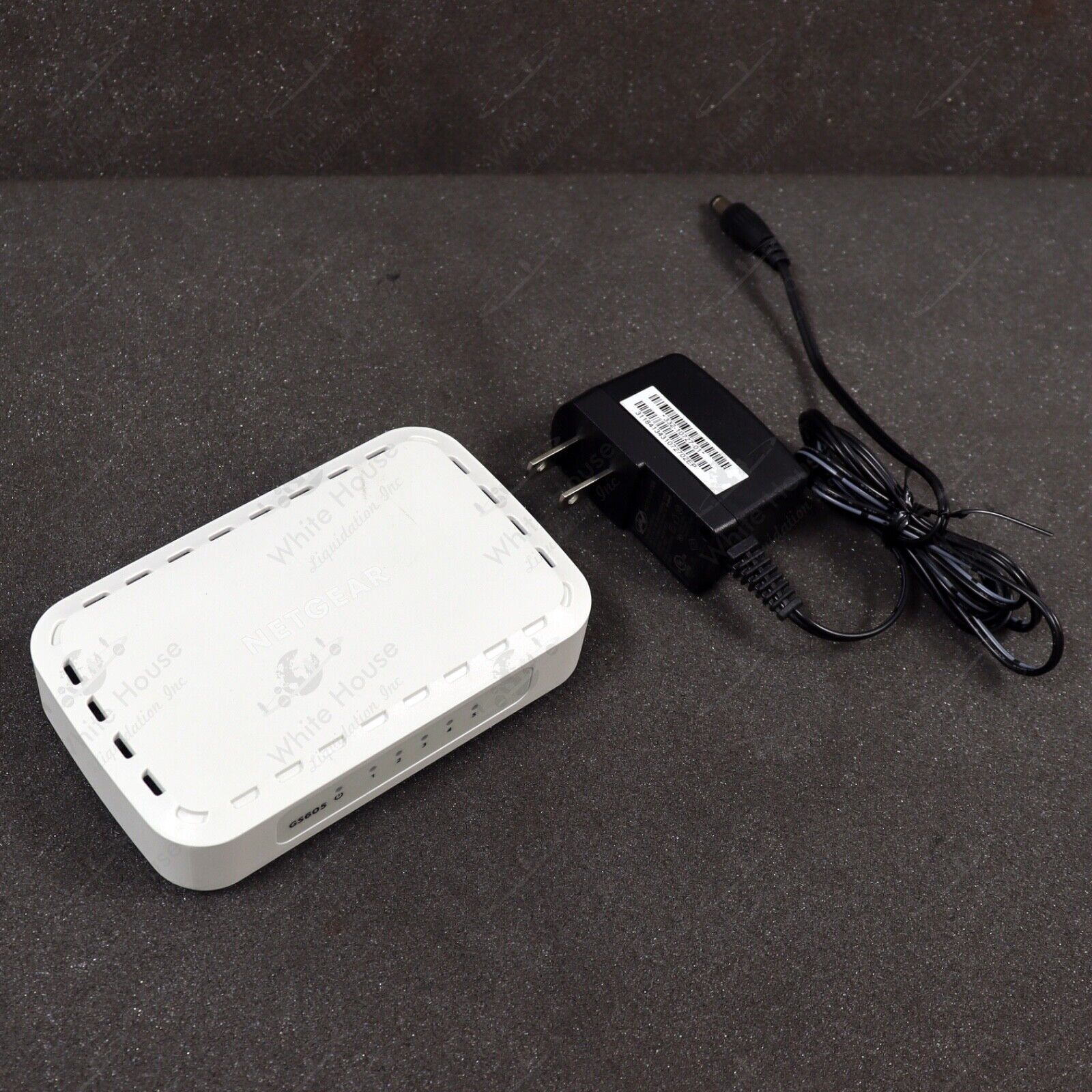Netgear GS605v5 5 Port Gigabit Ethernet Switch With AC Power Adapter - White