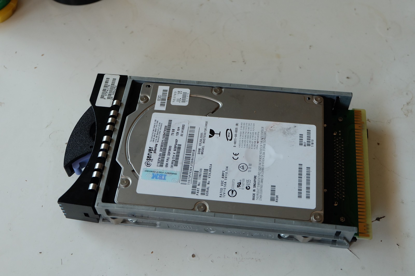 IBM 73GB 10K RPM SCSI SCA hard drive with pSeries tray 53P5456