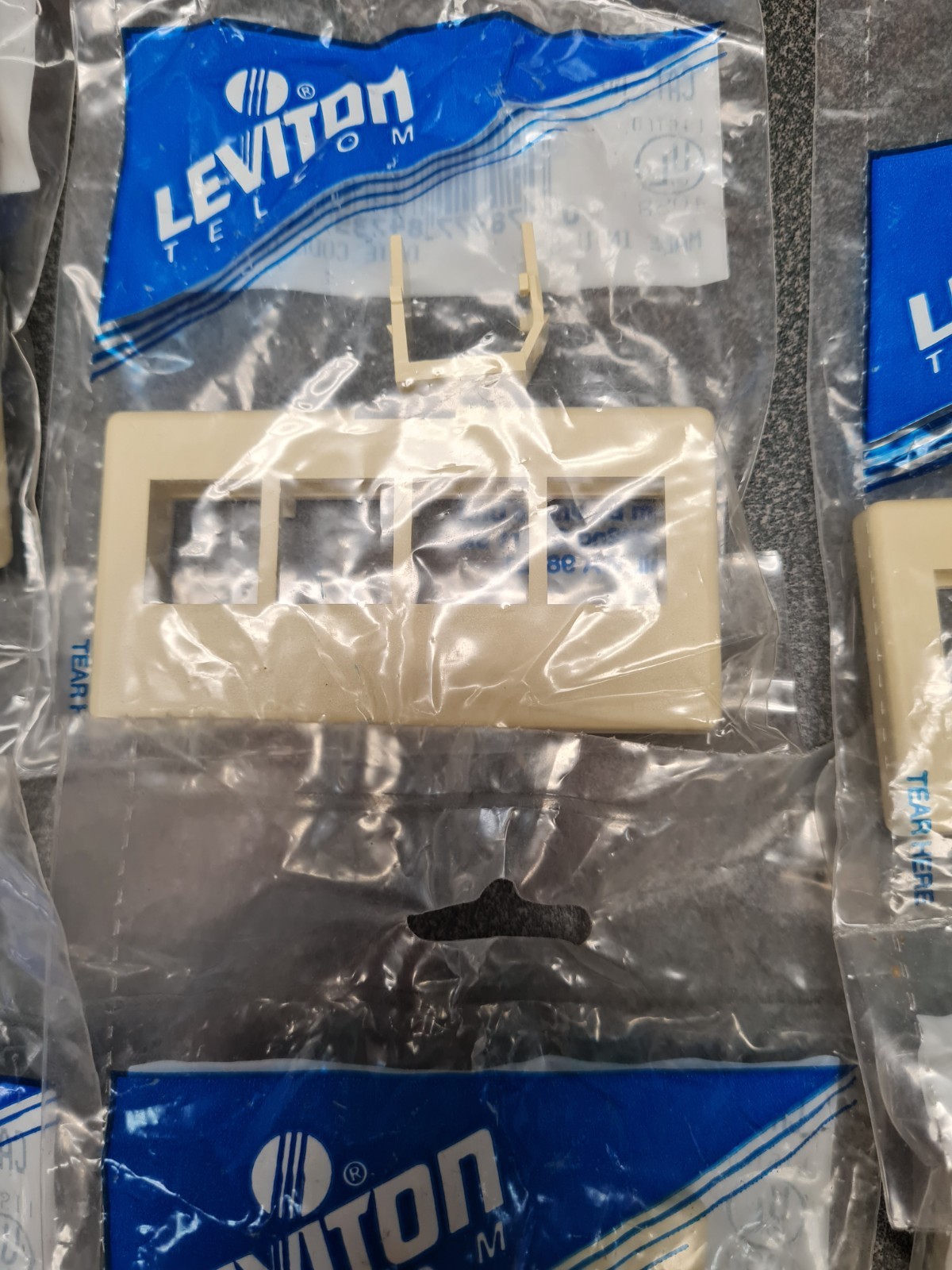 Lot of 14 -  Leviton (10) 49910-HW4, 4-Port,Ivory, (4) - 49910-SI2 Blank Inserts