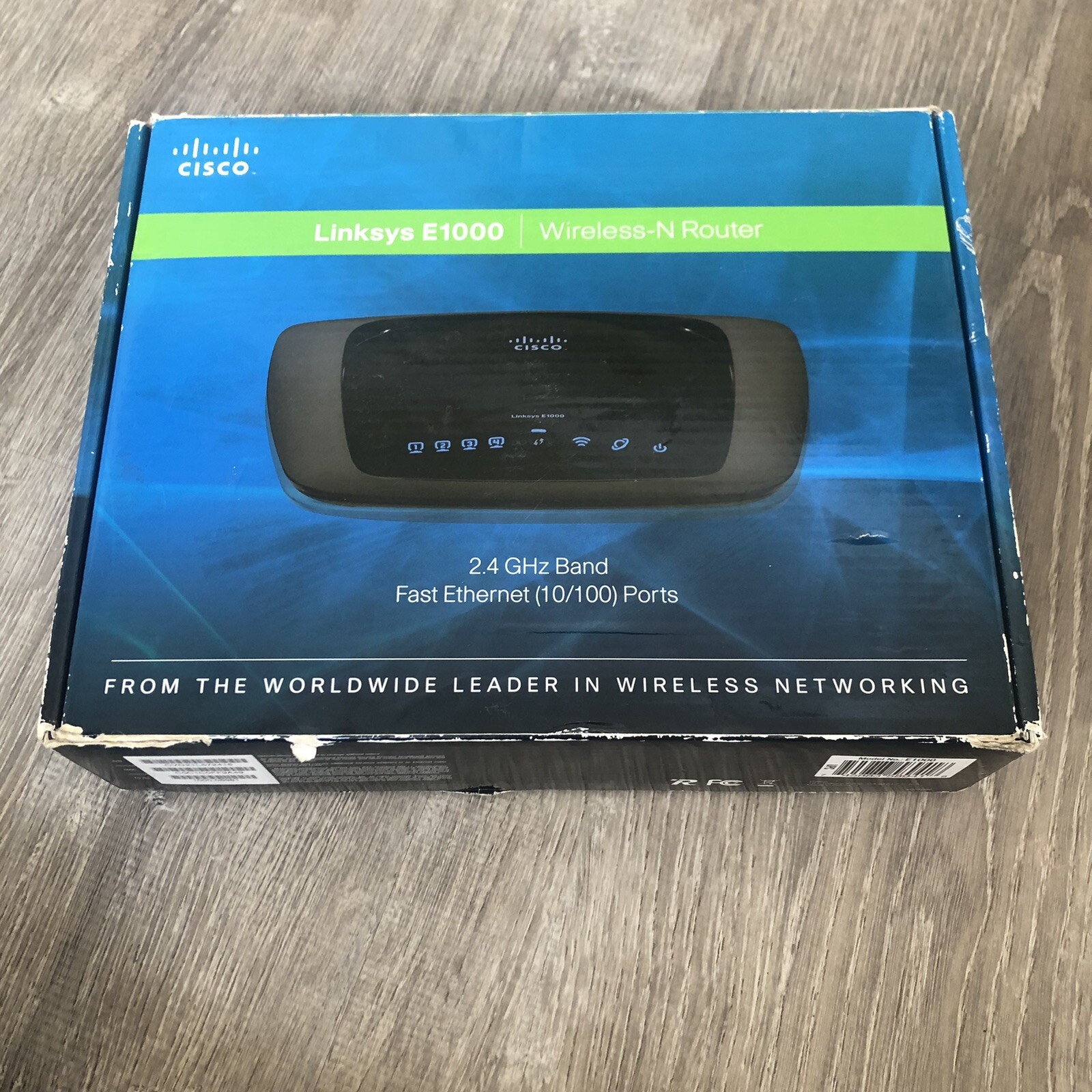 Linksys E1000 300 Mbps 4-Port 2.4 GHz Band 10/100 Wireless N Router