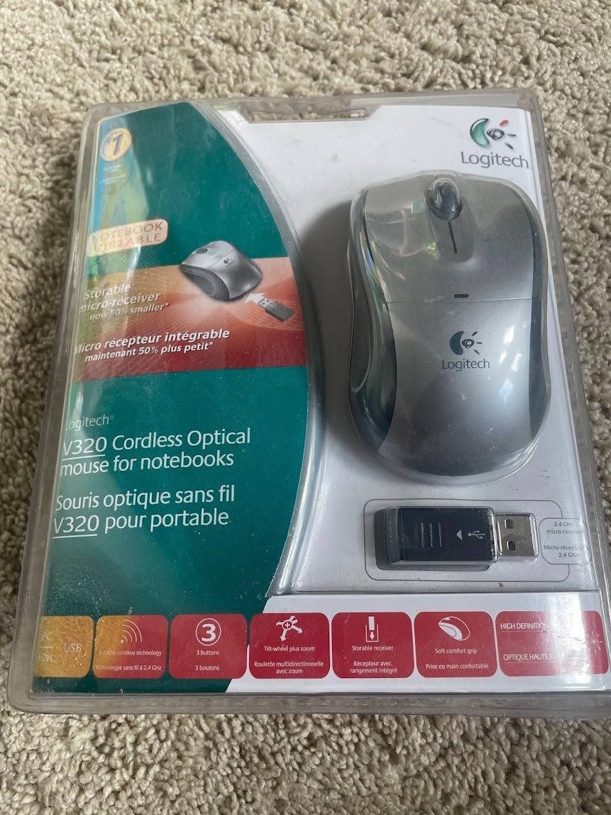 New/Sealed. Logitech V320 Gray Cordless Optical Mouse for NOTEBOOK USB Wireless