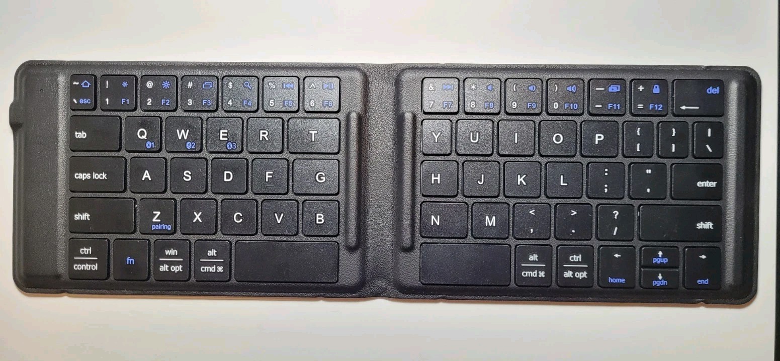 iClever Ultra Slim Mini Bluetooth Wireless Keyboard Folding Rechargeable IC-BK06