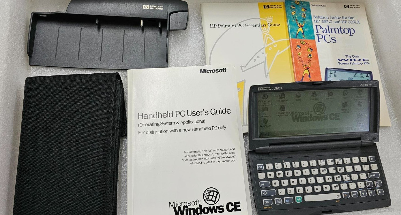 Hewlett Packard 320LX Handheld Palmtop 4MB F1221A ABA  w/ Case, Manuals, Cradle