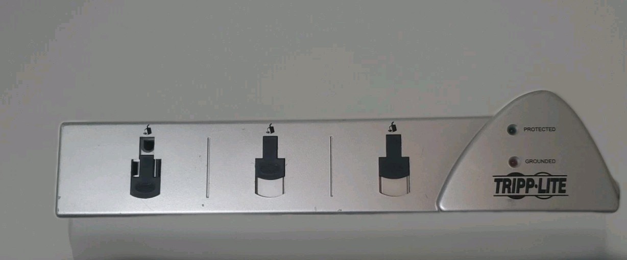 TRIPP-LITE Model TLP707TEL 7 Outlet Surge Suppressor 7ft Cord Tested