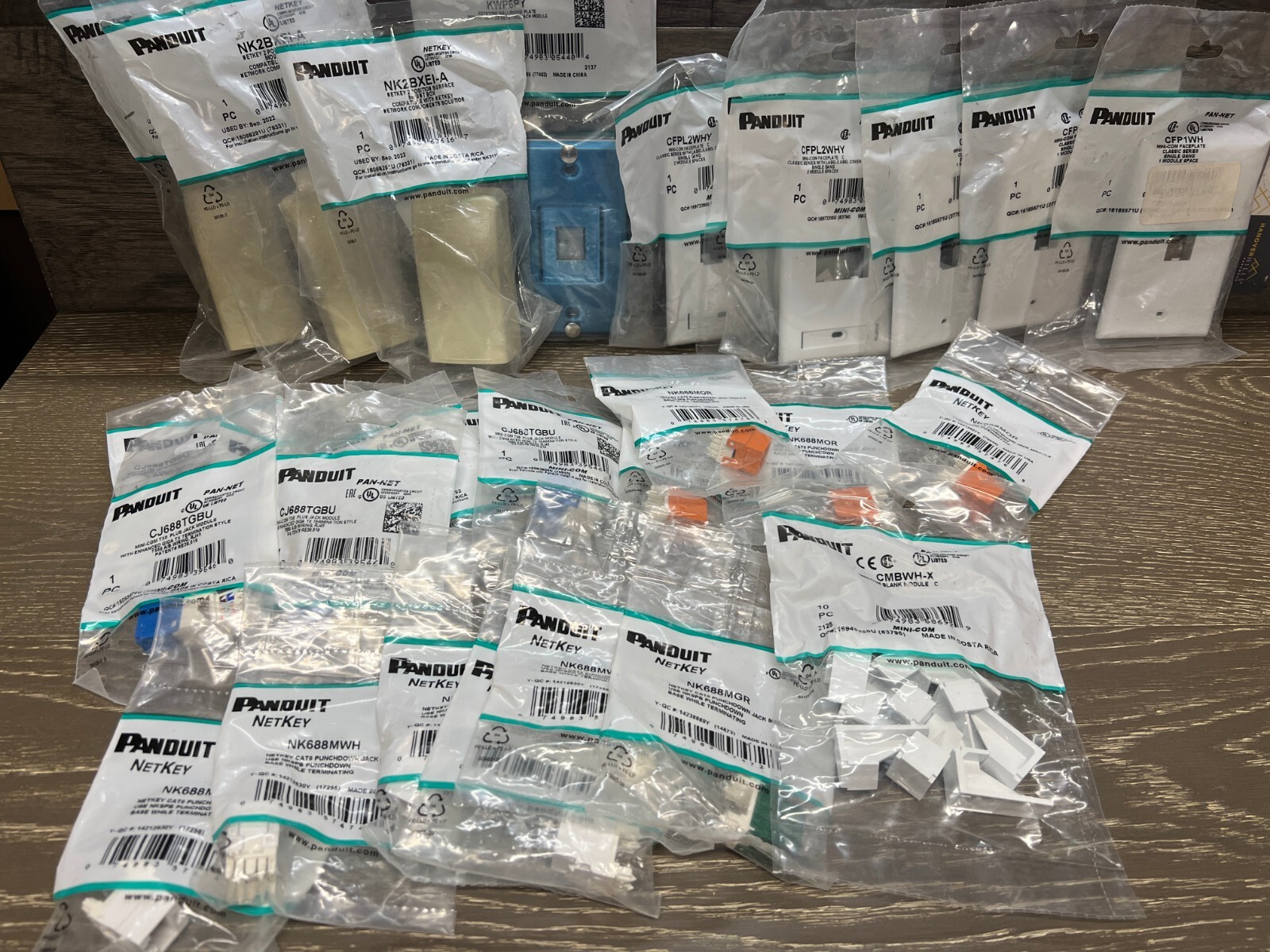 30 PIECE PANDUIT LOT - FACEPLATES, SURFACE MOUNTS, AND JACKS - SEE PICTURES