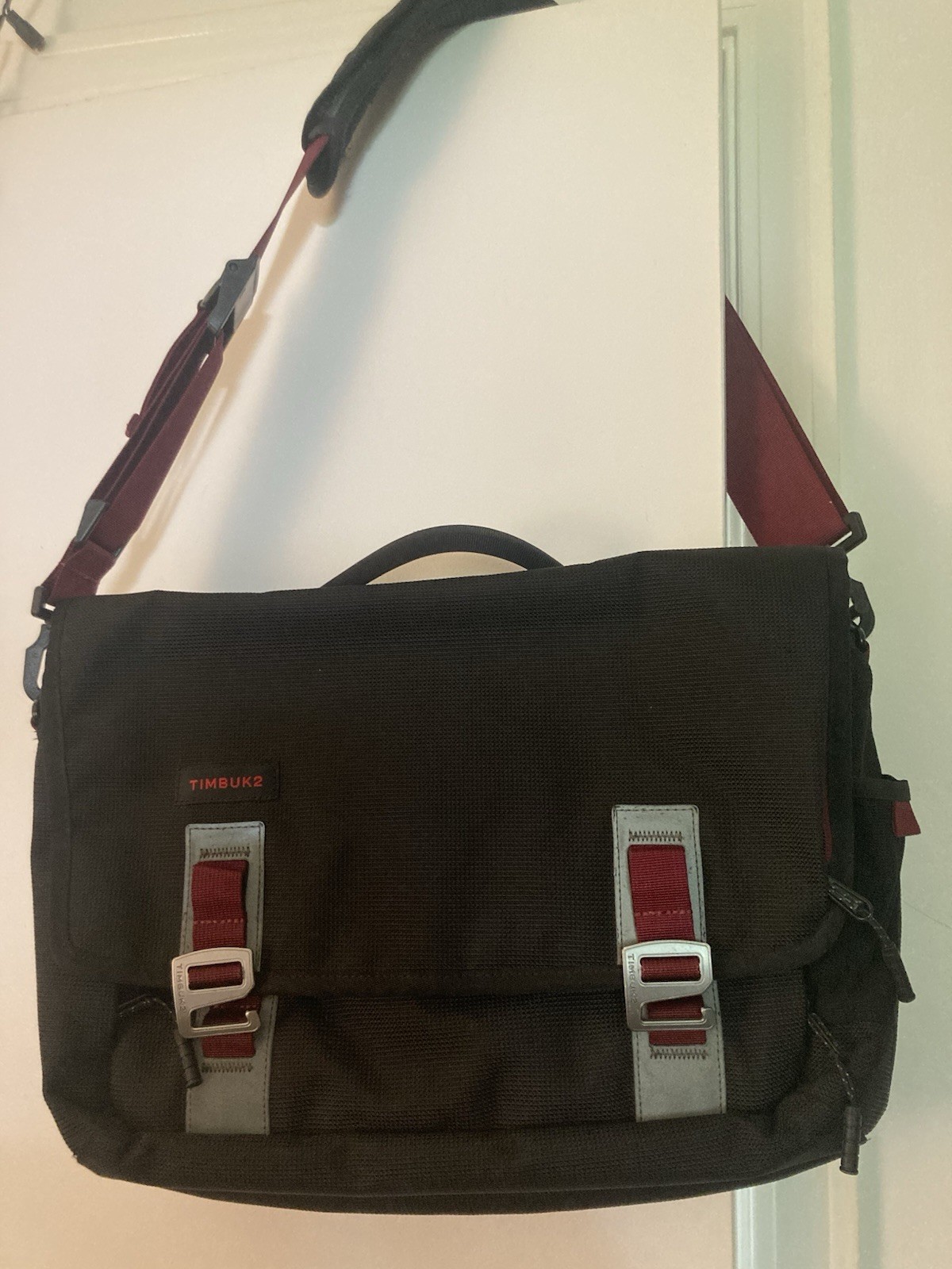 Timbuk2 Command Messenger Bag. Black And Maroon With Red Interior Size Small
