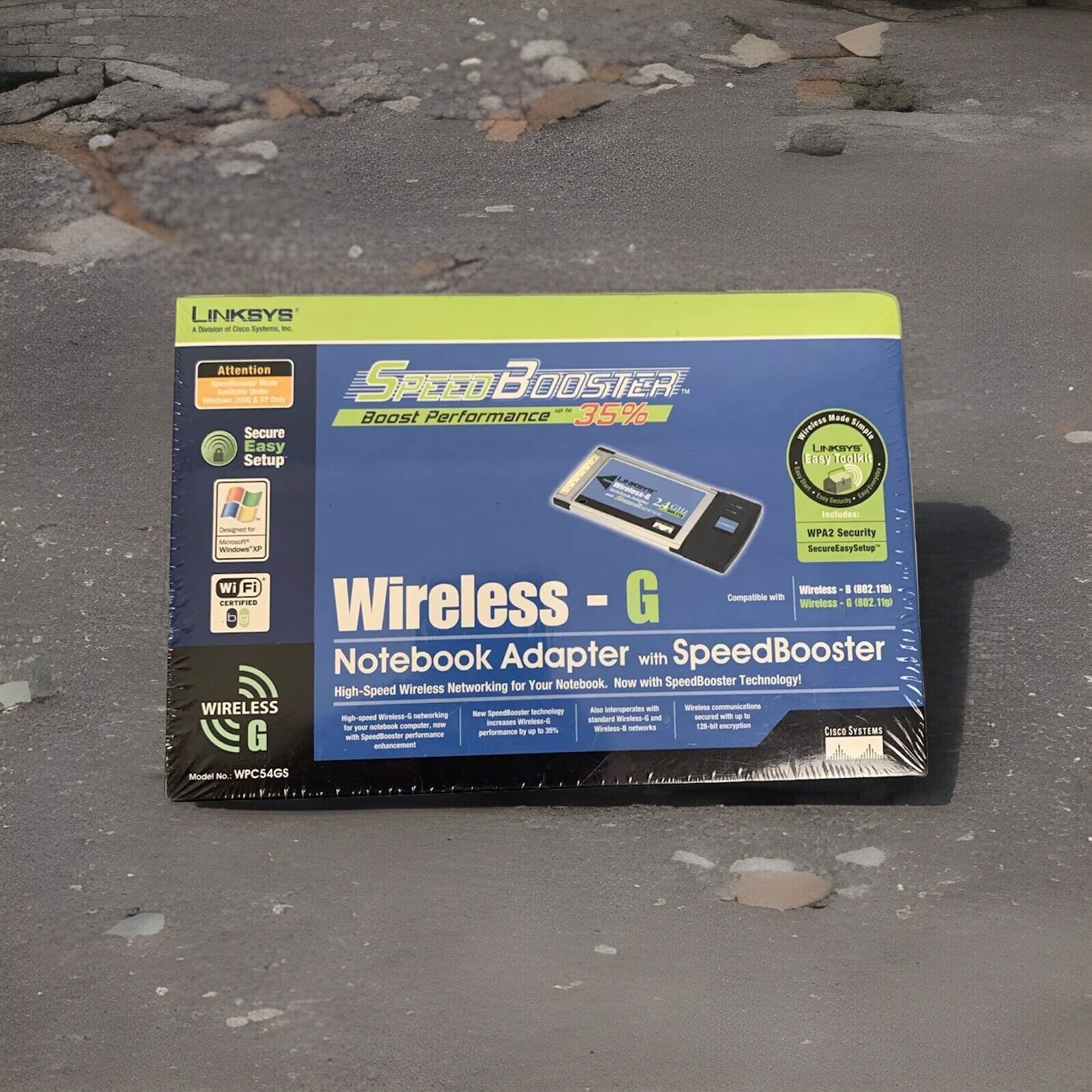 Linksys WPC54GS Wireless-G Notebook Adapter with Speed Booster Sealed