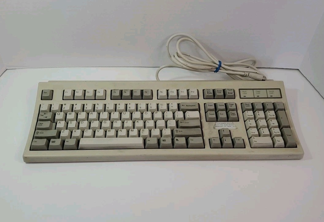 NMB Technologies Micron RT6856TW PS2 Beige Wired Keyboard