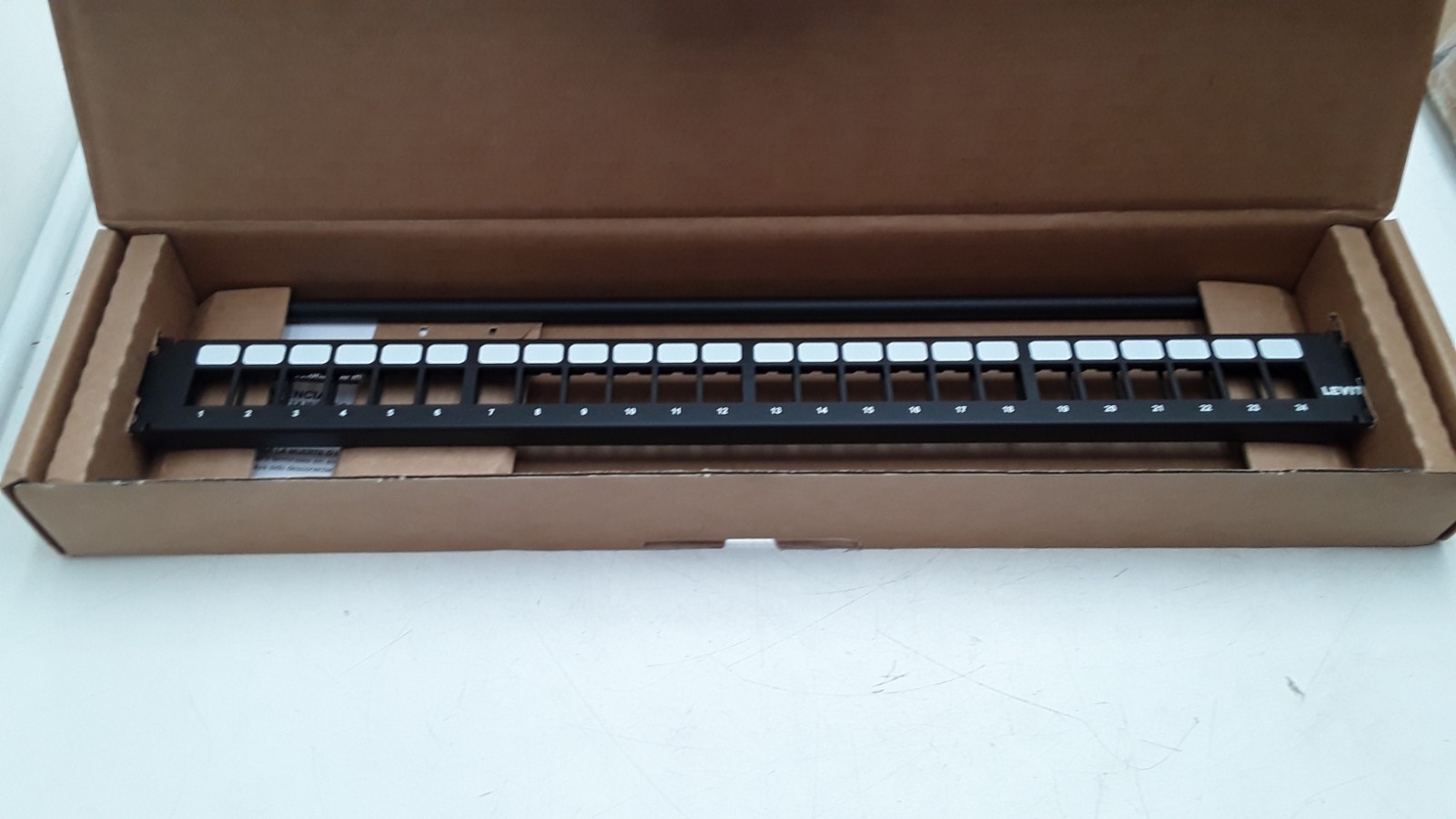 Leviton | 49255-H24 | Flat QuickPort 24-Port Patch Panel | Black