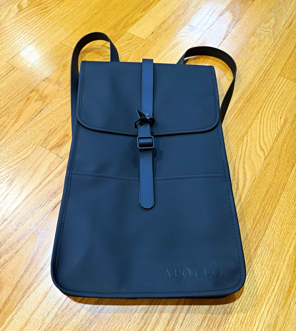 Rains Black Water-Resistant Polyurethane Backpack for 15 in Laptop