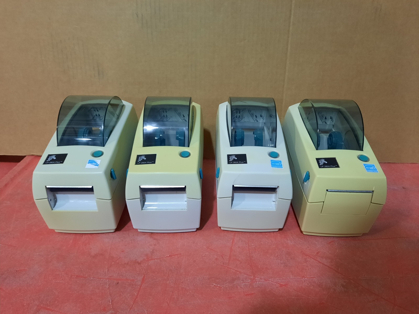 Lot of 4  Zebra LP2824 Plus Thermal Label Printer ALL UNITS POWER ON FOR PARTS