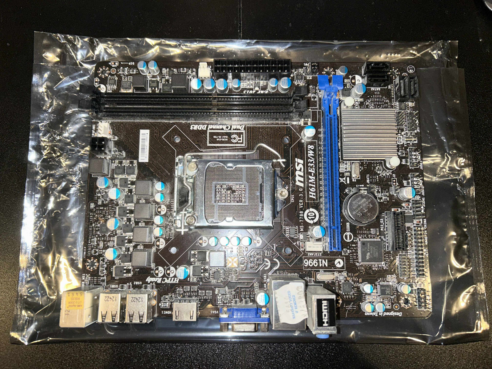 MSI H61M-E33/W8 LGA 1155 Intel H61 HDMI Micro ATX Intel Motherboard