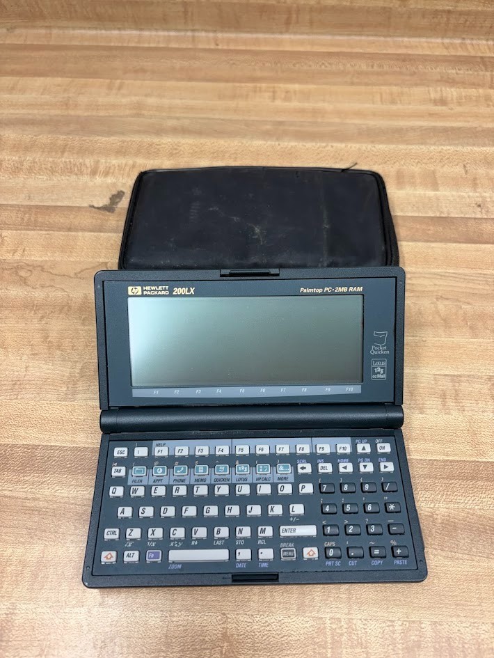 HP 200LX Palmtop PC 2MB RAM MS-DOS Vintage Pocket Computer AS-IS Wonky Screen
