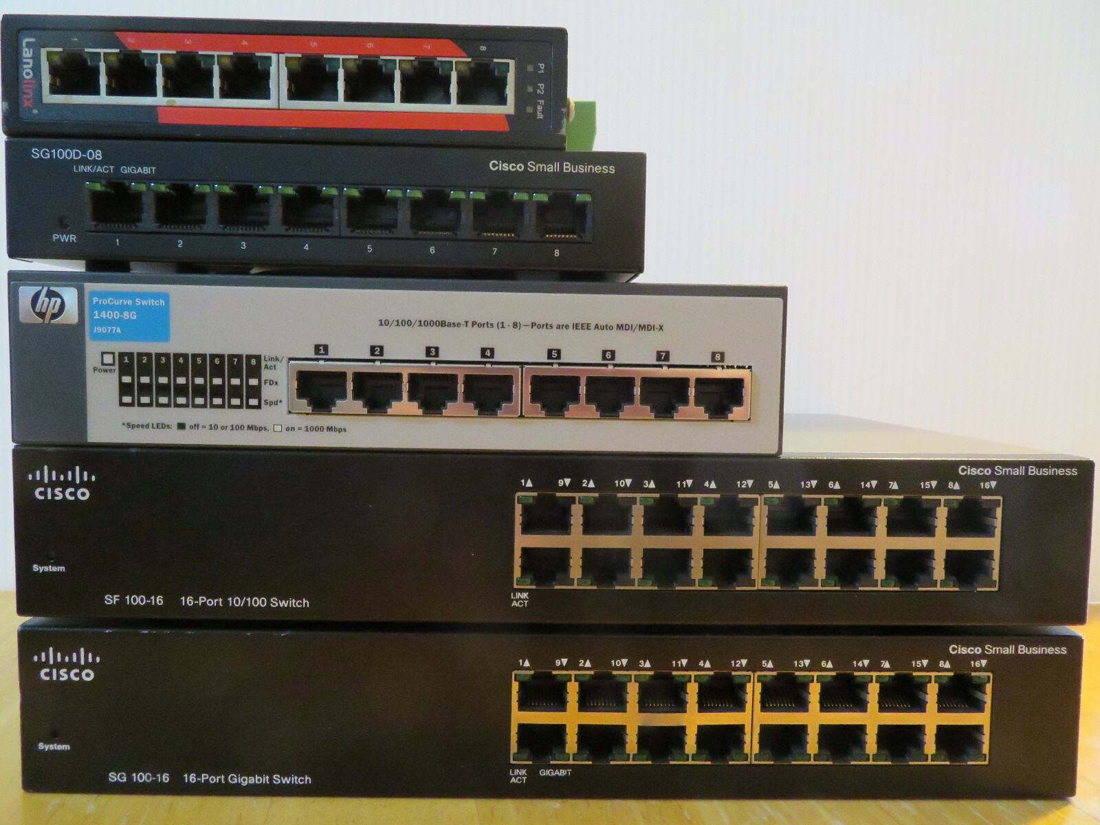 Lot of 5 Network Switches - Cisco, HP, LanoLinx - some power cords included