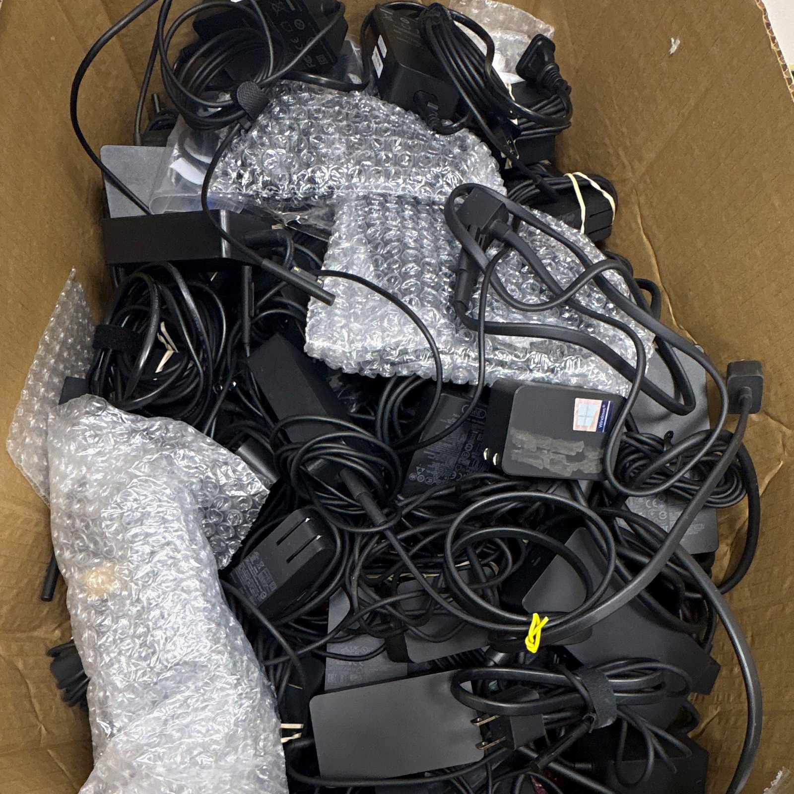 Lot of 60+ Microsoft Surface Pro 3-X chargers. Tested and working