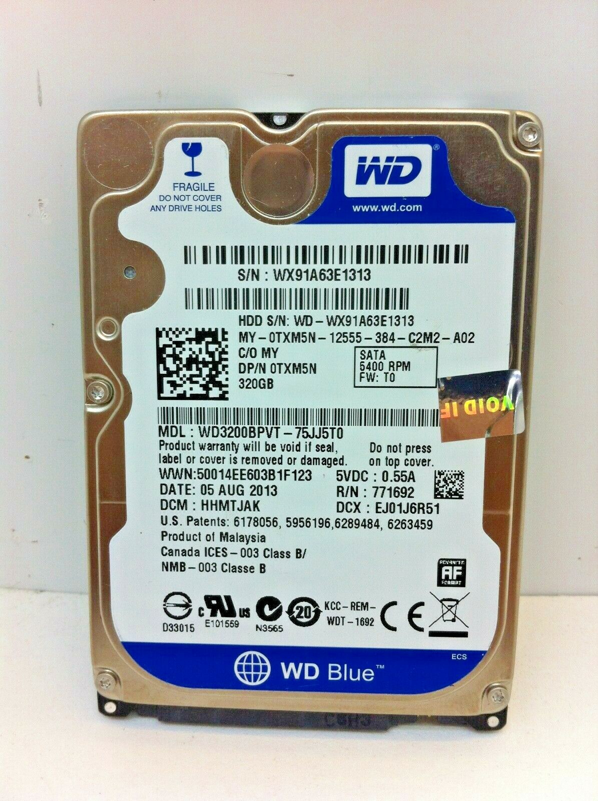 Dell TXM5N WD Scorpio Blue 320GB 5400RPM 2.5 WD3200BPVT-75JJ5T0 - Hard Drive 236