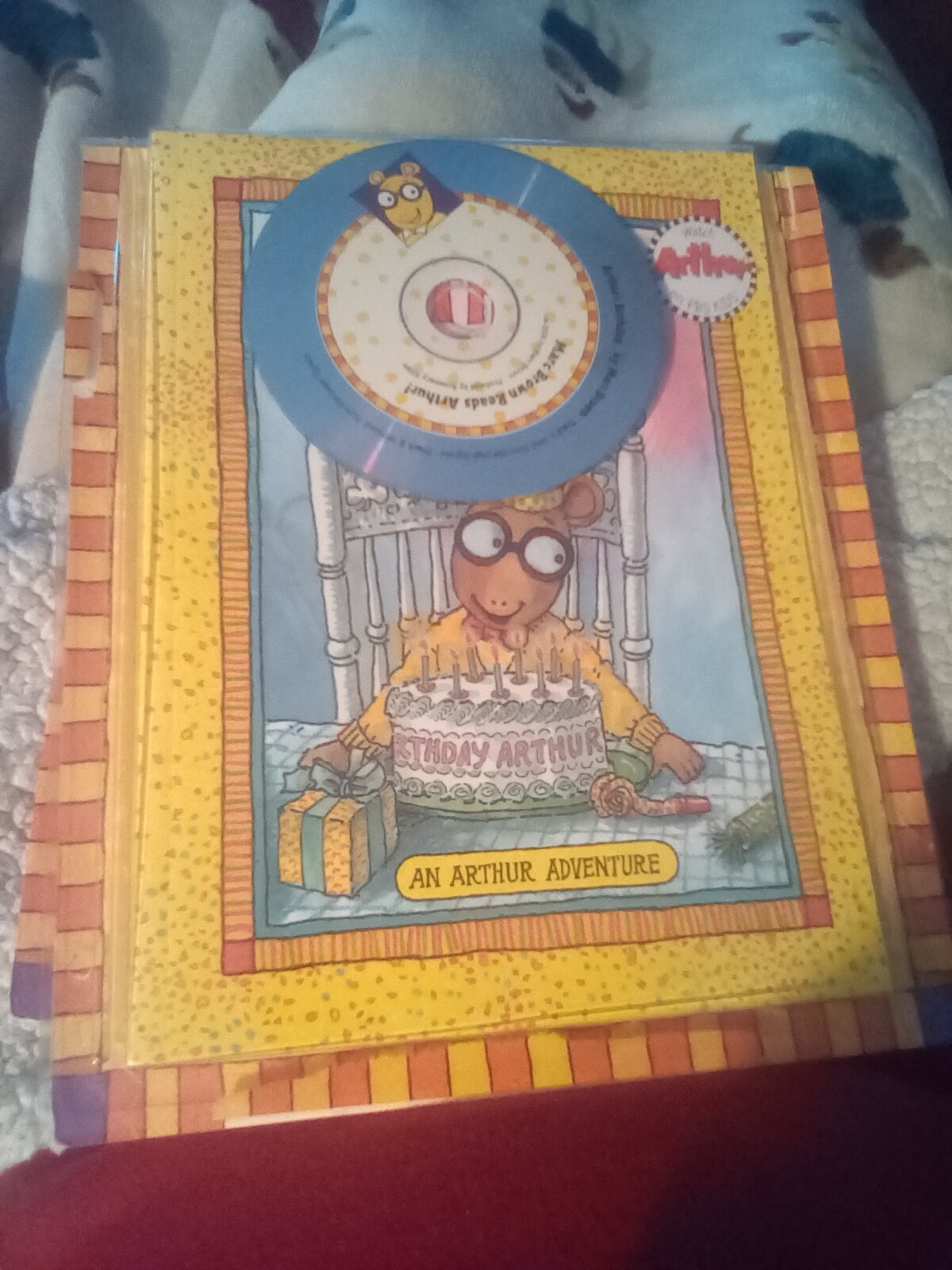 Arthur’s Birthday CD and read a long book.  CD has minor scratches. Plays good