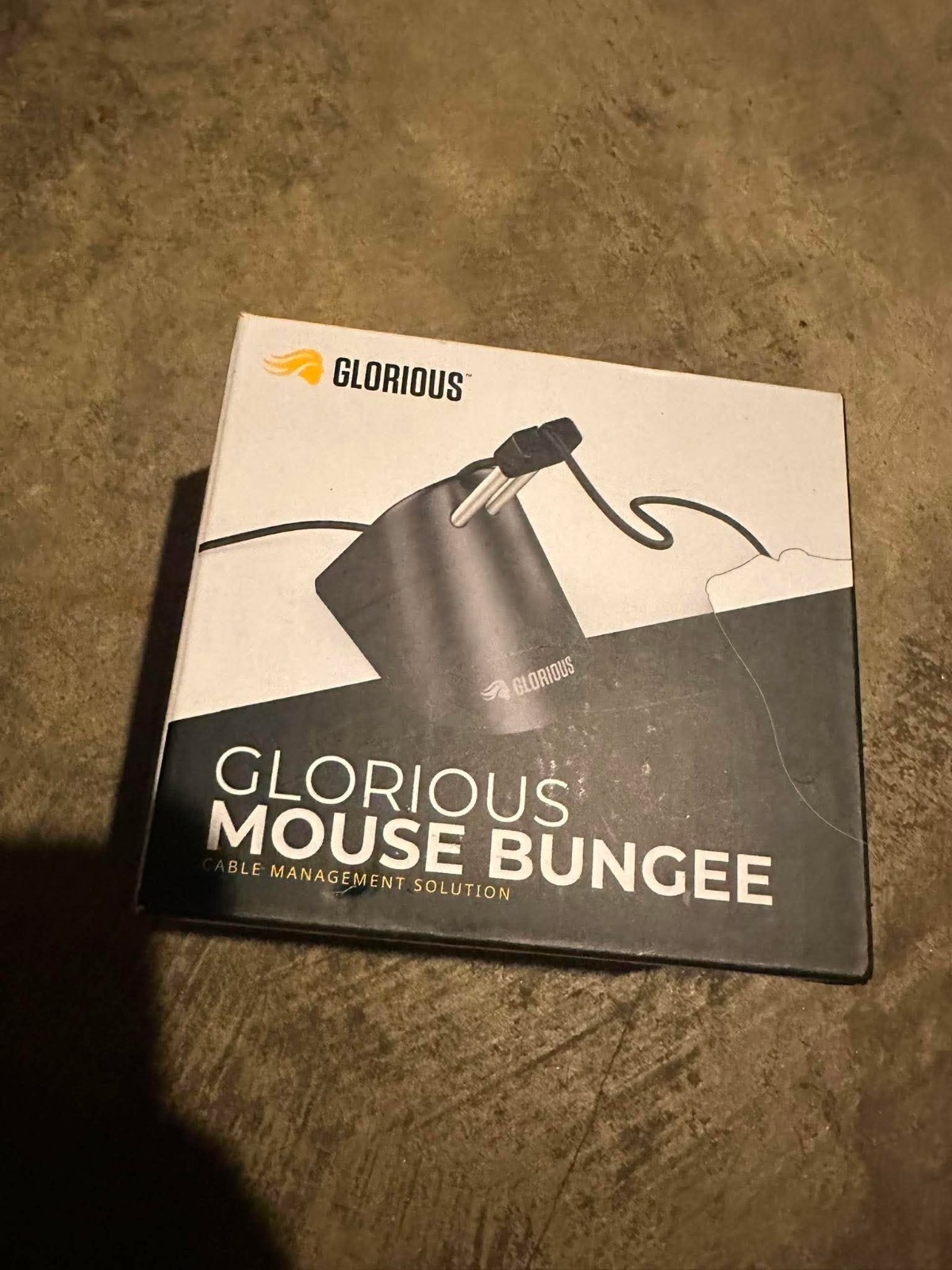 This is a Glorious Mouse Bungee Designed for Cable Management