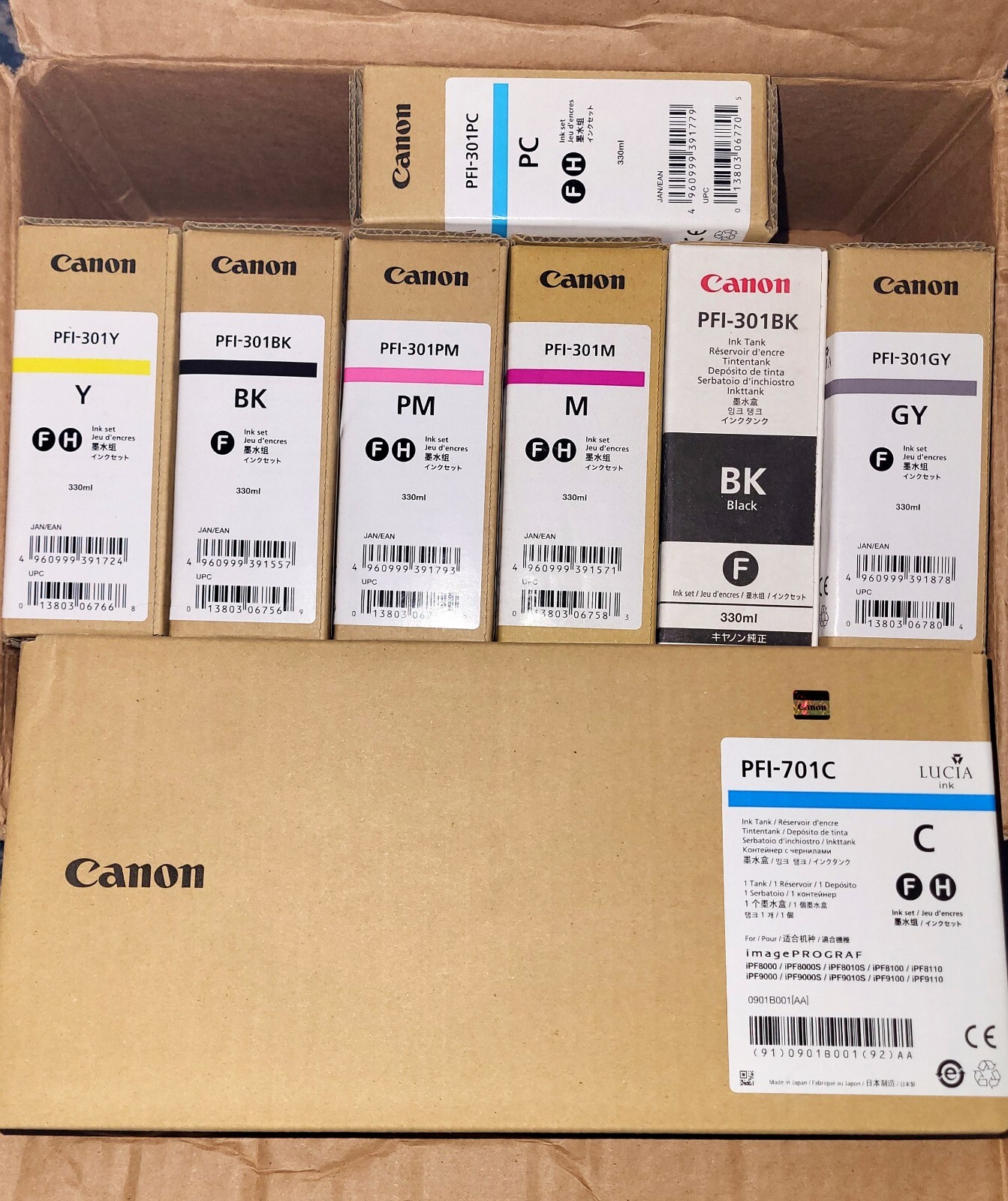 Canon Ink PFI- 301Y, 301BK, 301PM, 301M, 301BK, 301GY, 301PC  And One 701C LOT