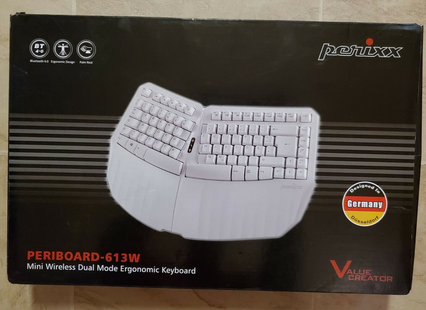 Perixx PERIBOARD-613W Mini Wireless Dual Mode Ergonomic Keyboard.  
