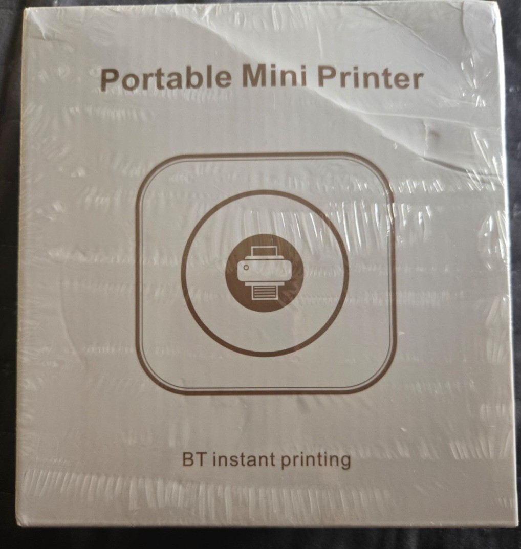 This item is a portable thermal mini printer designed for wireless bluetooth