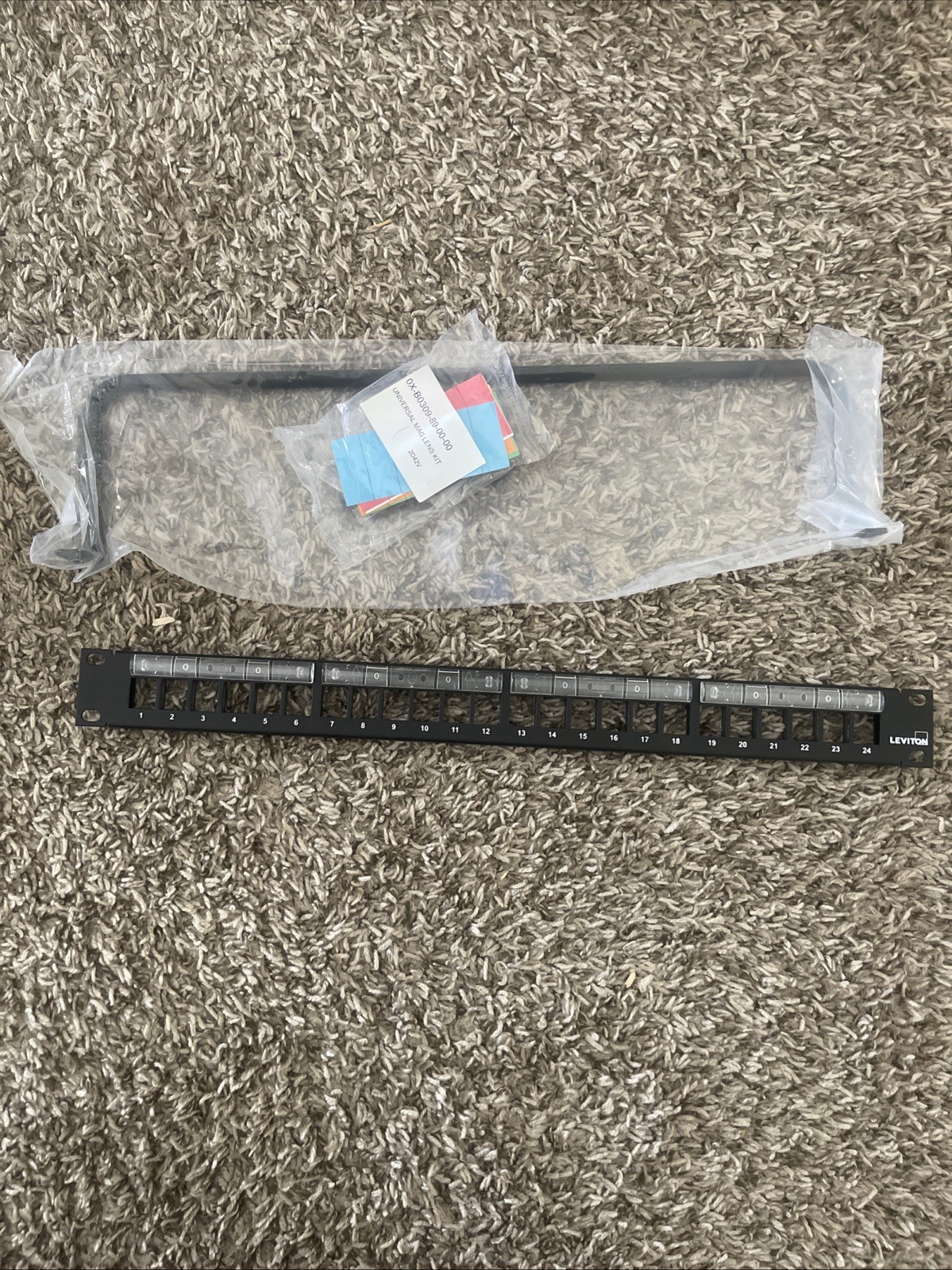 Leviton 49255-L24 1RU 24‑Port Patch Panel with Magnifying Lens Label Holder