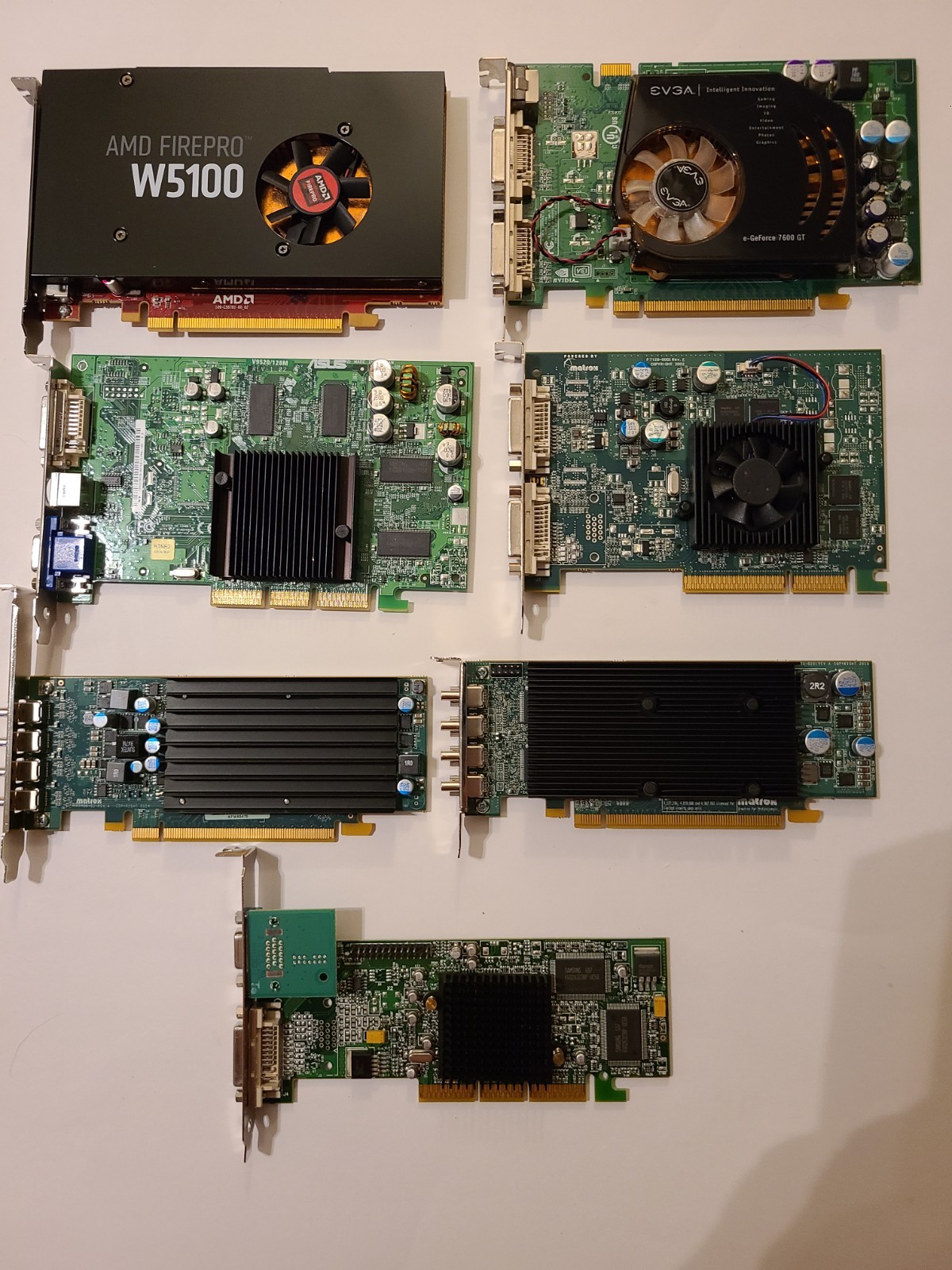 Lot of 7 Video Cards -Matrox, AMD, Geforce- P750, C420, G550, AMD W5100, FX5200