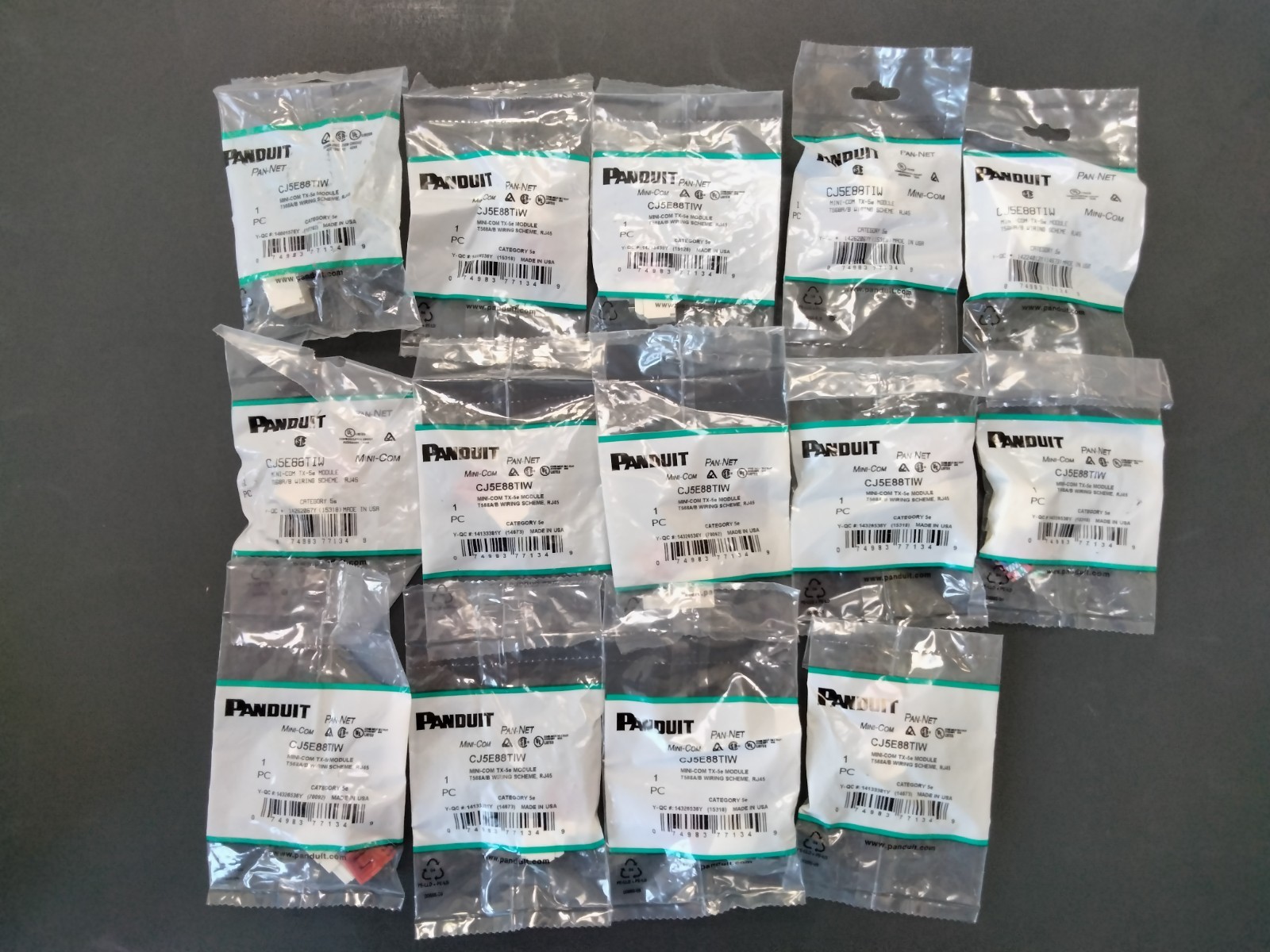 (QTY14)Panduit Category5E 8-Wire T-Style Red/offWhite Model #CJ5E88TIW Mini-Com