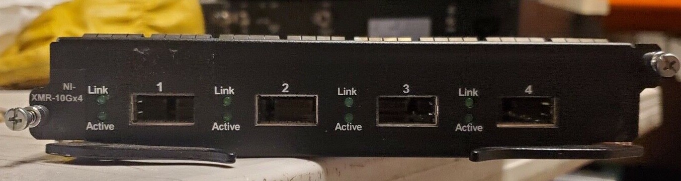 Used Brocade (NI-XMR-10GX4) - 10GbE 4 Port Module w/ 4x 10G-XFP-SR - Replacement