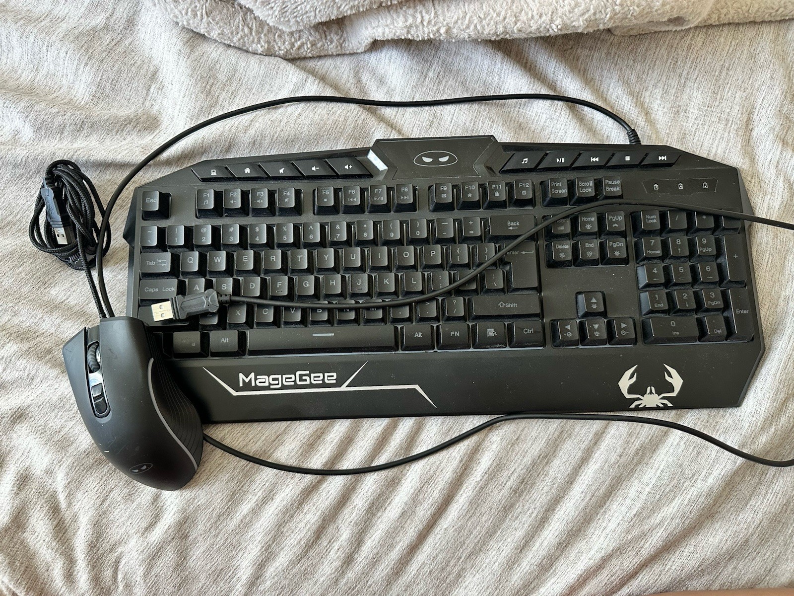 The item shown is a MageGee gaming keyboard and mouse combo set.