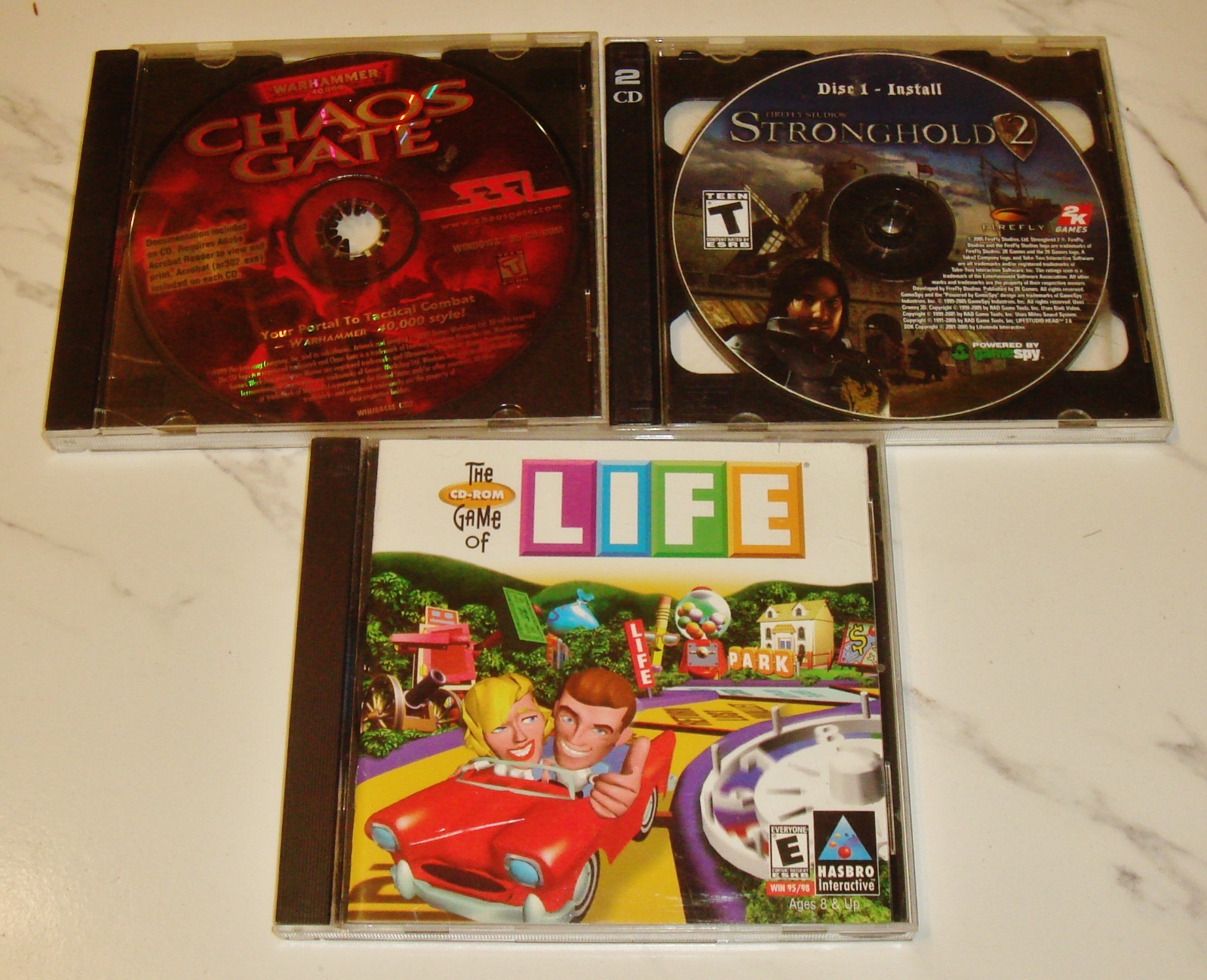 Vintage The Game of Life (1998) Windows 95/98 PC CD +Stronghold 2  + Chaos Gate