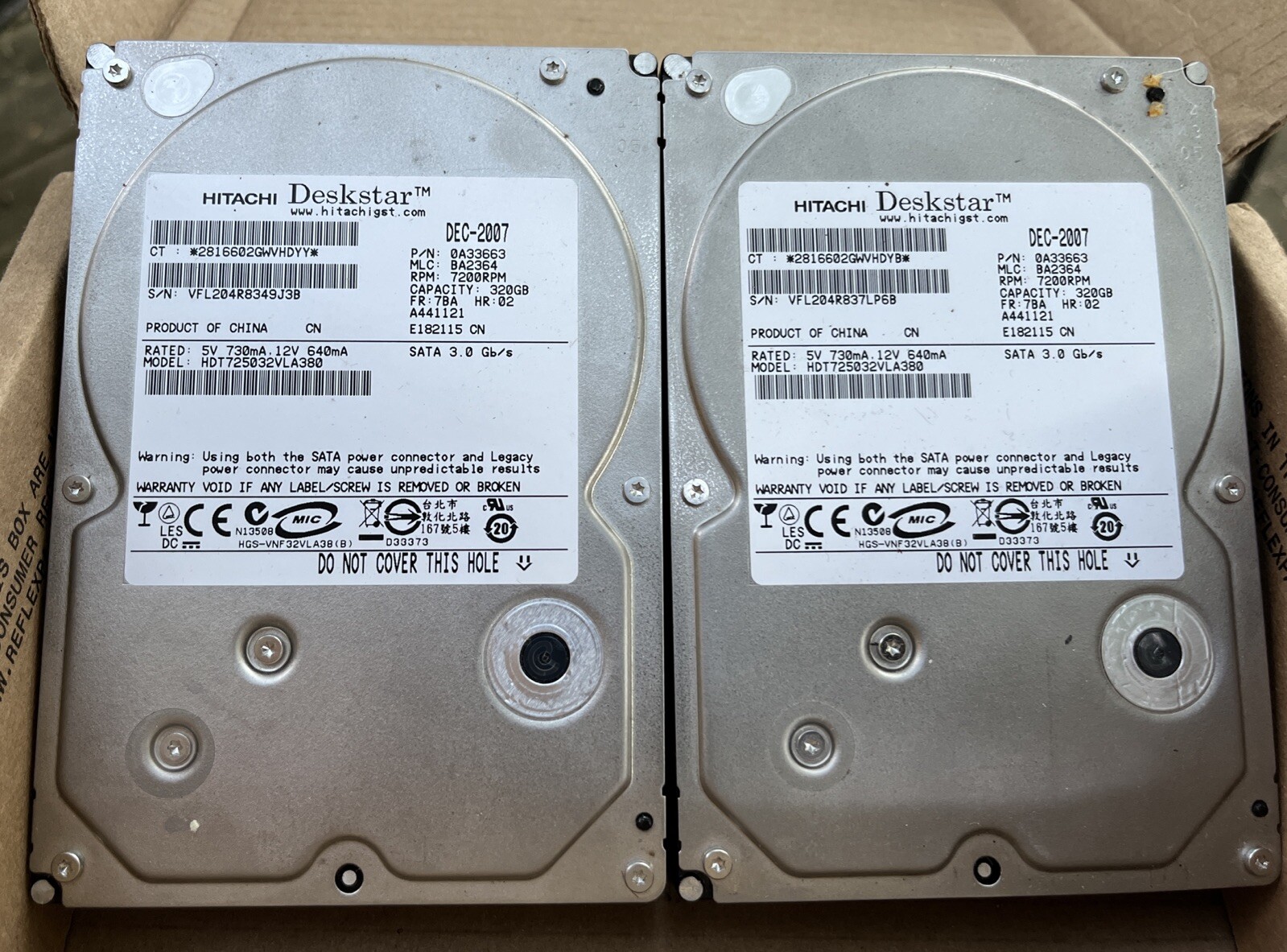 2- Hitachi Deskstar both with 320Gb, HDT725032VLA380 Dec-2007 0A33663 BA2364