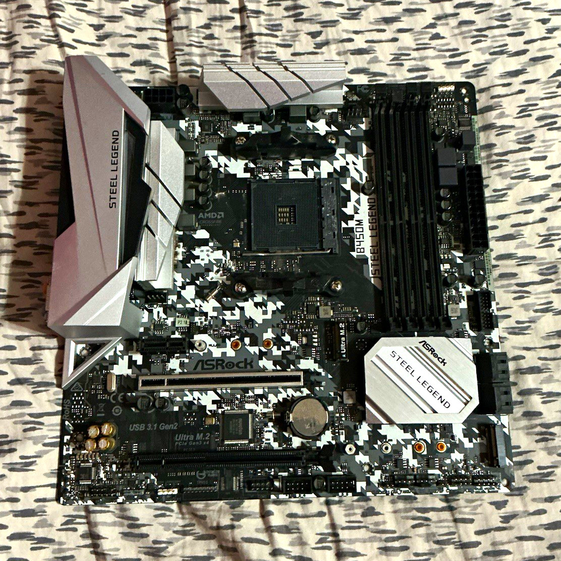 ASRock B450M Steel Legend MicroATX AM4 DDR4 4-Slot Gaming Motherboard